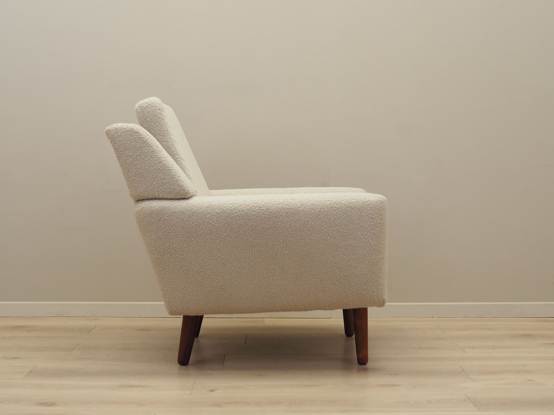 Armchair, ivory bouclé, rosewood, Denmark, 1970s. - 78645