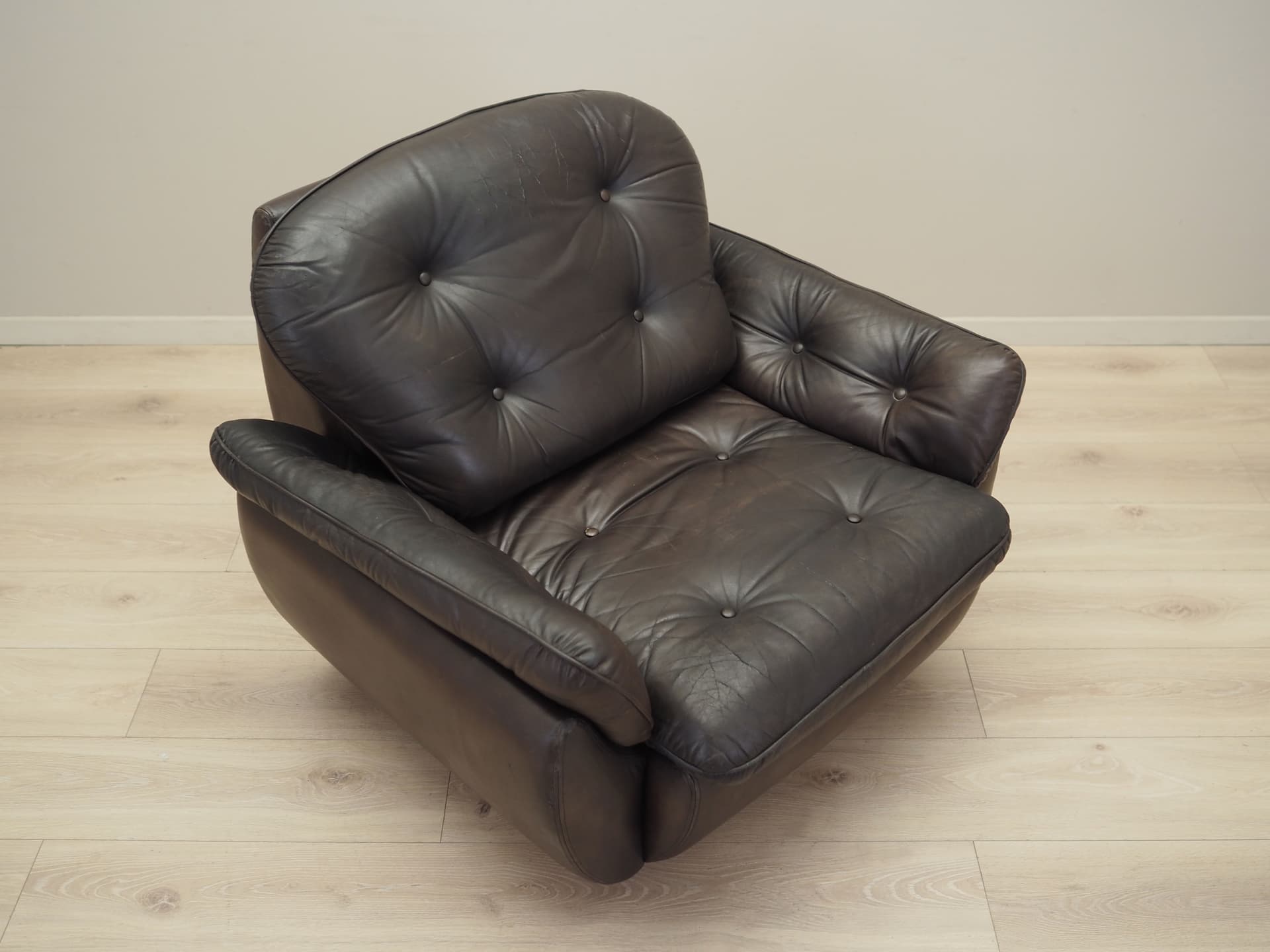 Armchair, dark brown natural leather, Italy, 1970s. - 81218