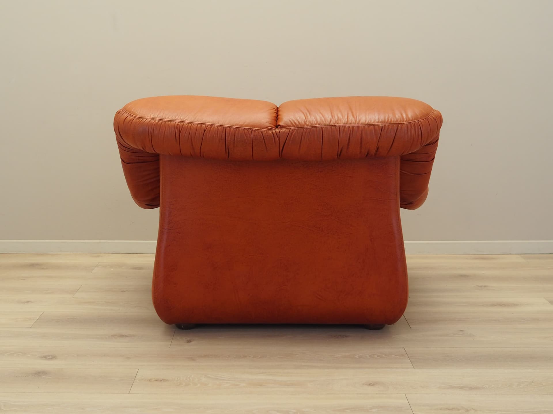 Lounge chair, burnt orange, natural leather, Italy, 1970s. - 81731
