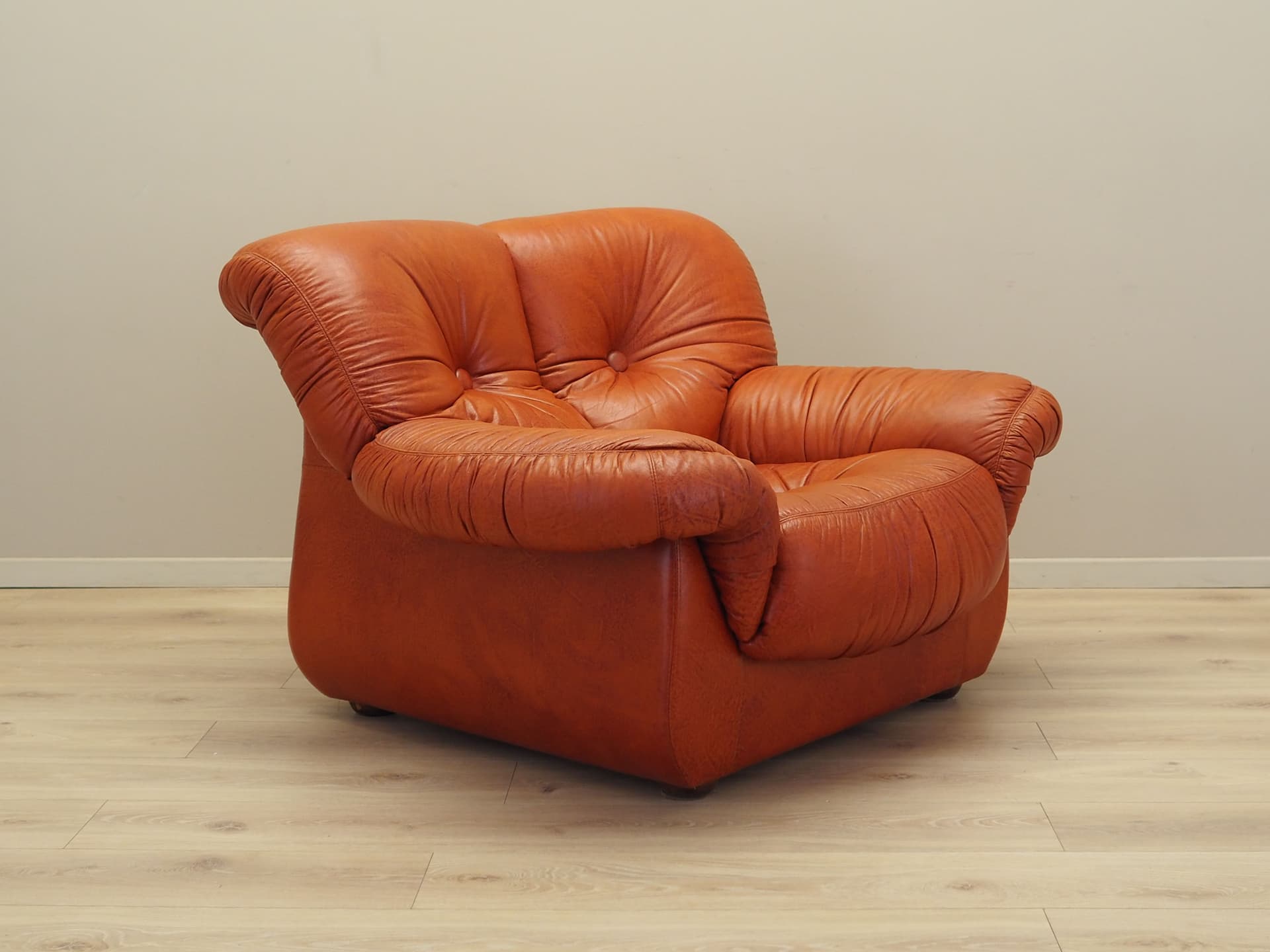 Lounge chair, burnt orange, natural leather, Italy, 1970s. - 81734