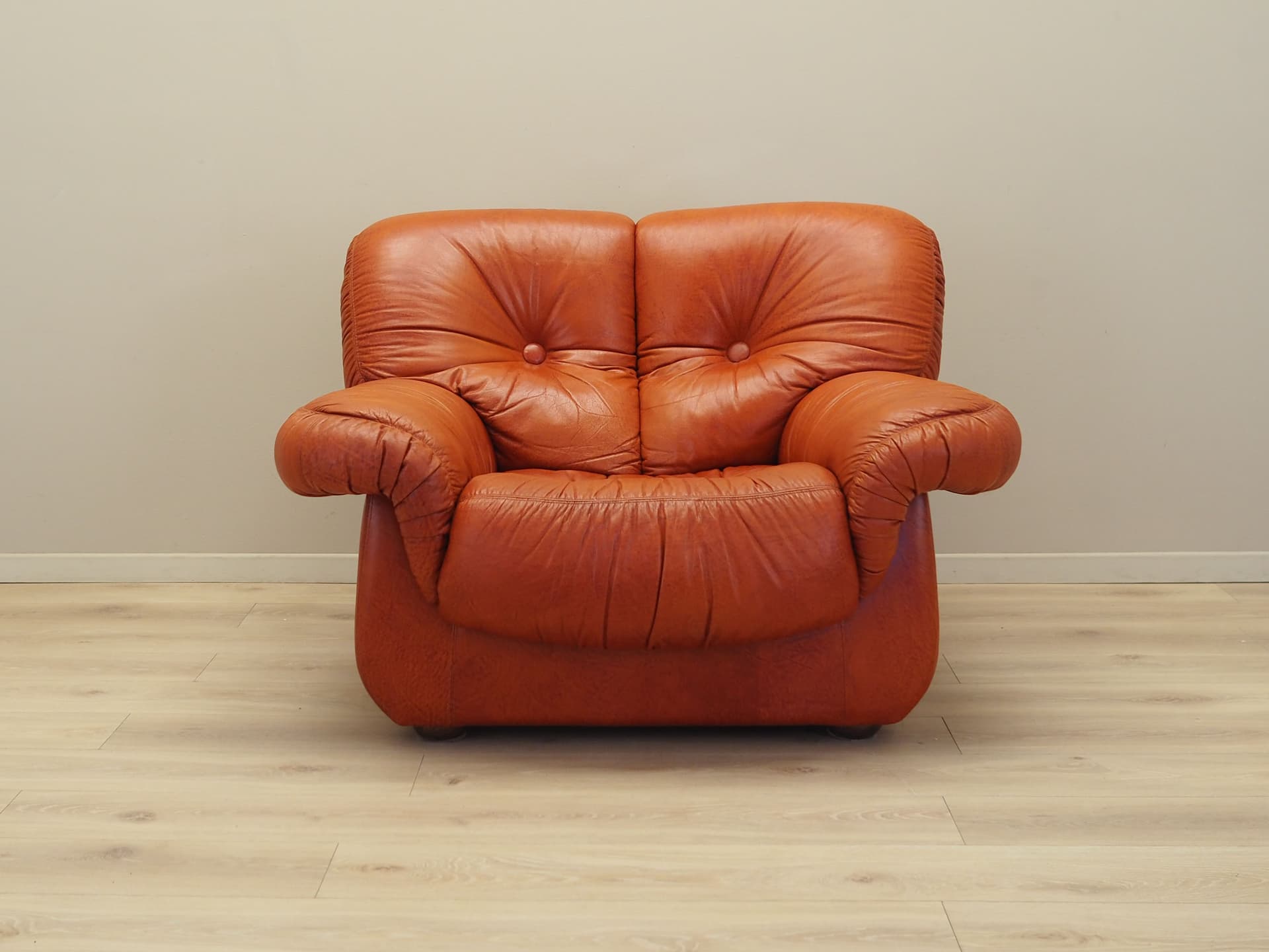 Lounge chair, burnt orange, natural leather, Italy, 1970s. - 81732