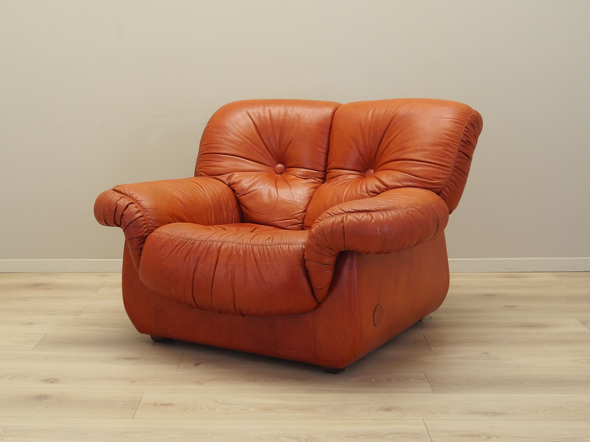 Lounge chair, burnt orange, natural leather, Italy, 1970s. - 81730