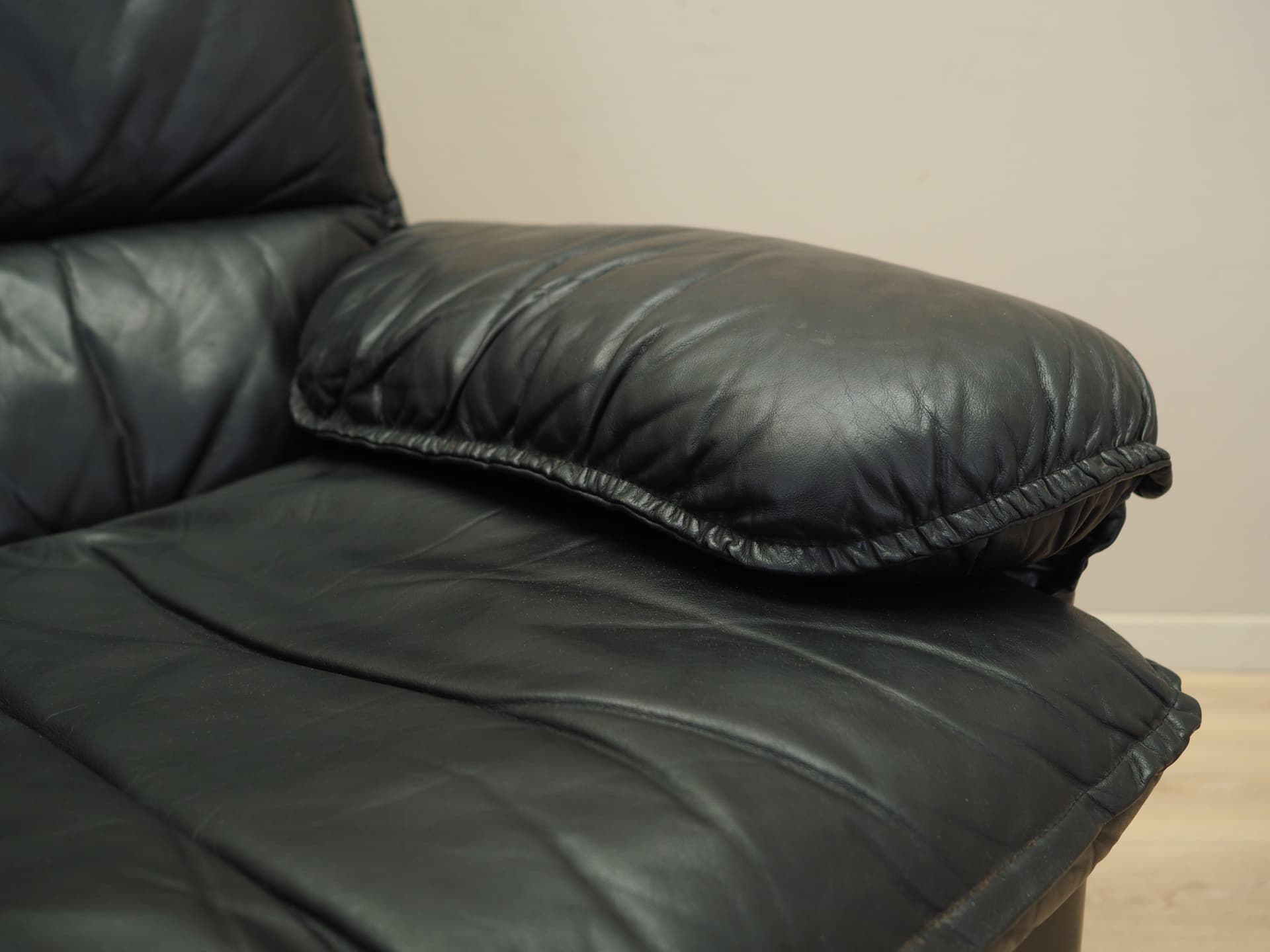 Lounge chair, black leather, Italy, 1970s. - 82432