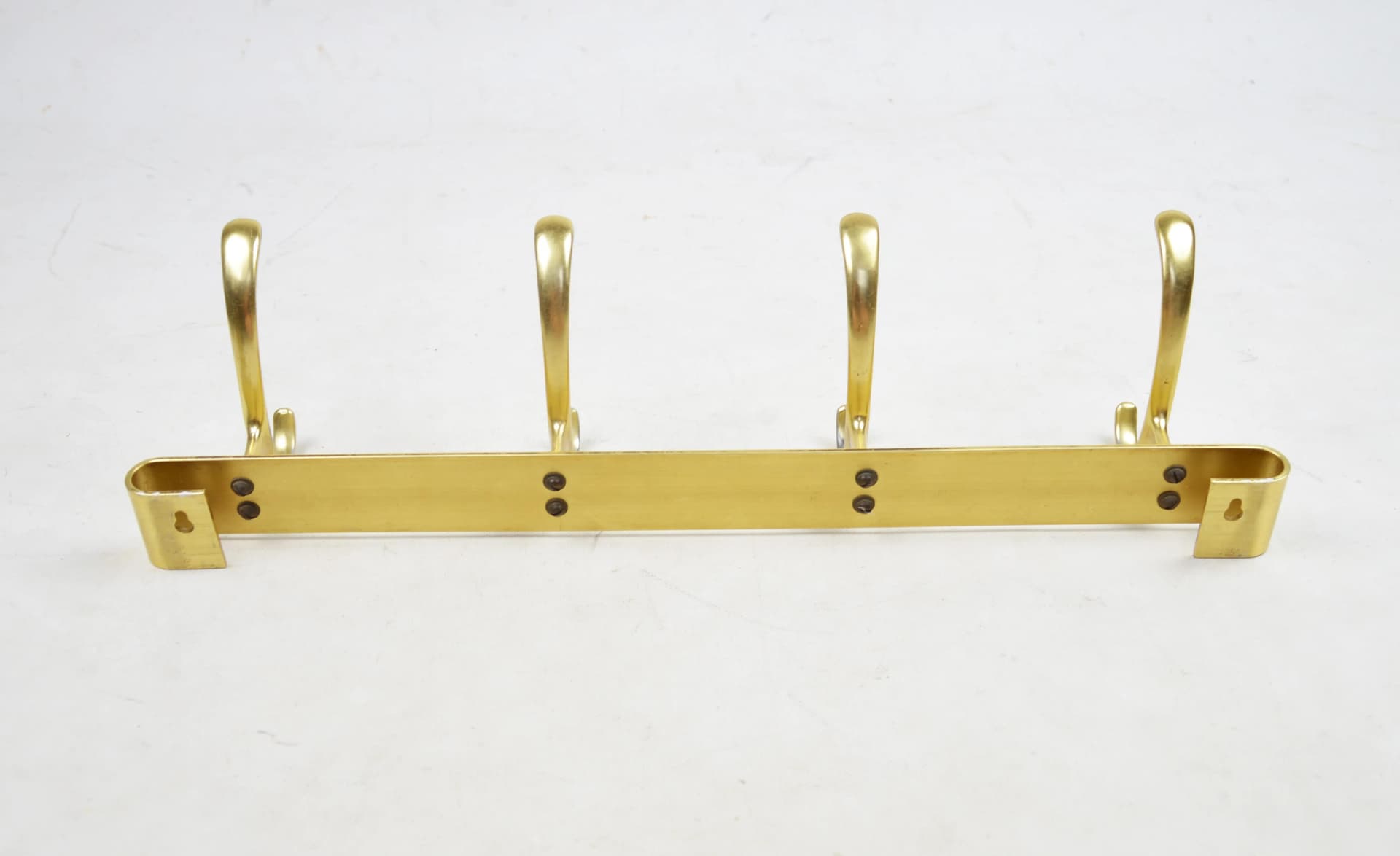 Golden Modernist Wall-mounted Coat Rack, Poland, 1970s - 83021