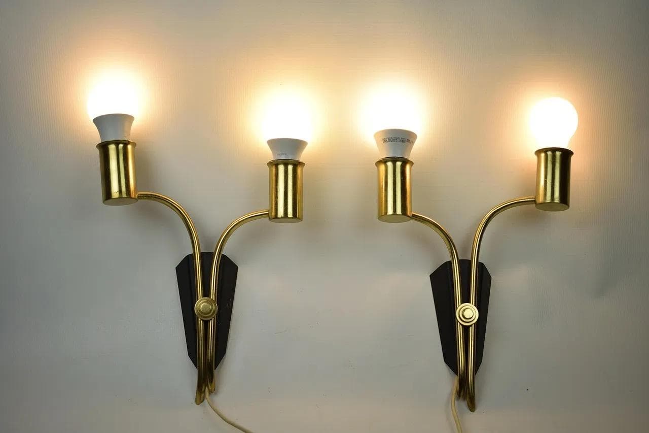 Pair of wall sconces, golden brass, black metal, Sweden, 1960s. - 85963