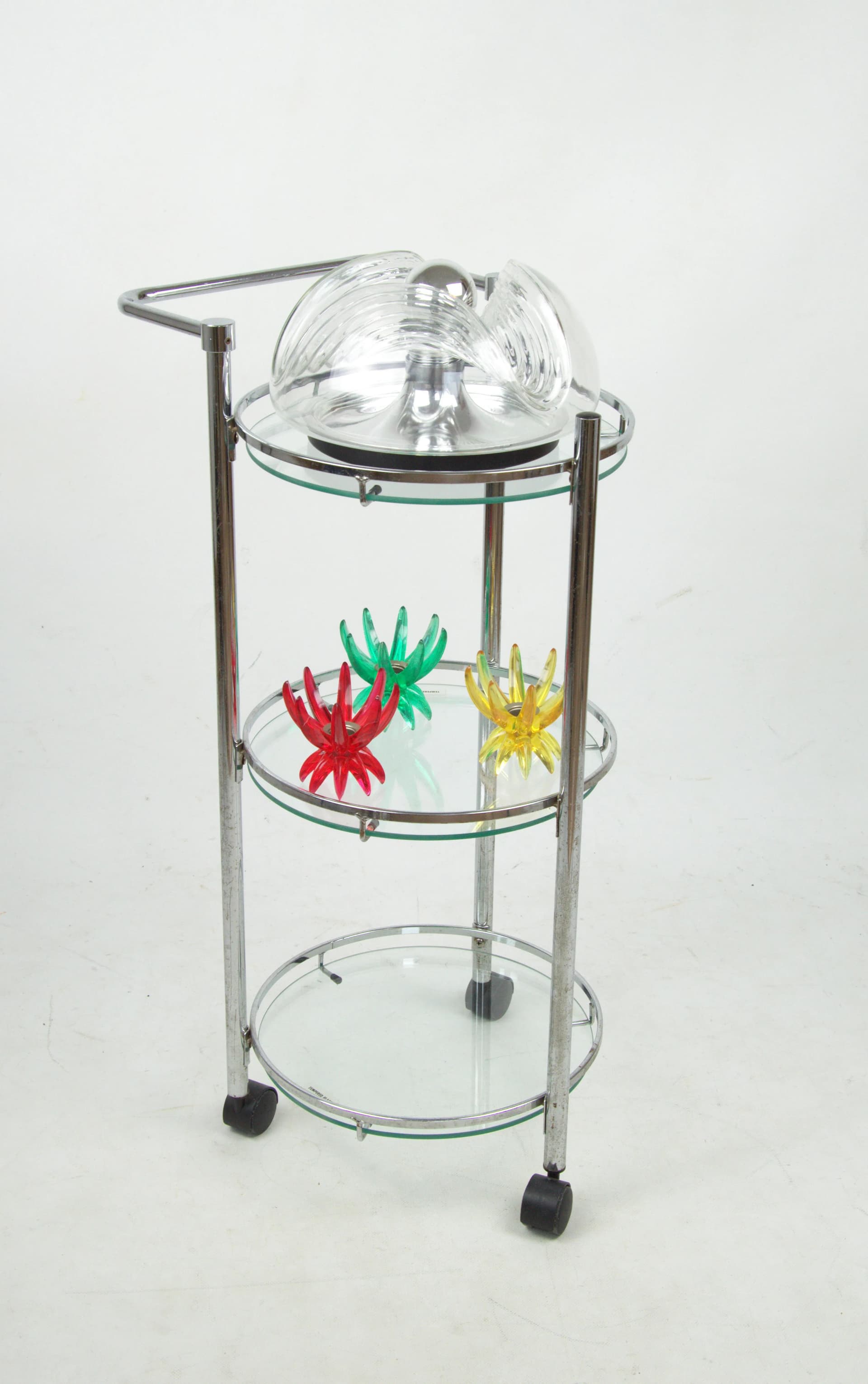 Mobile shelving unit, silver chrome, transparent glass, Poland, 1980s. - 85427