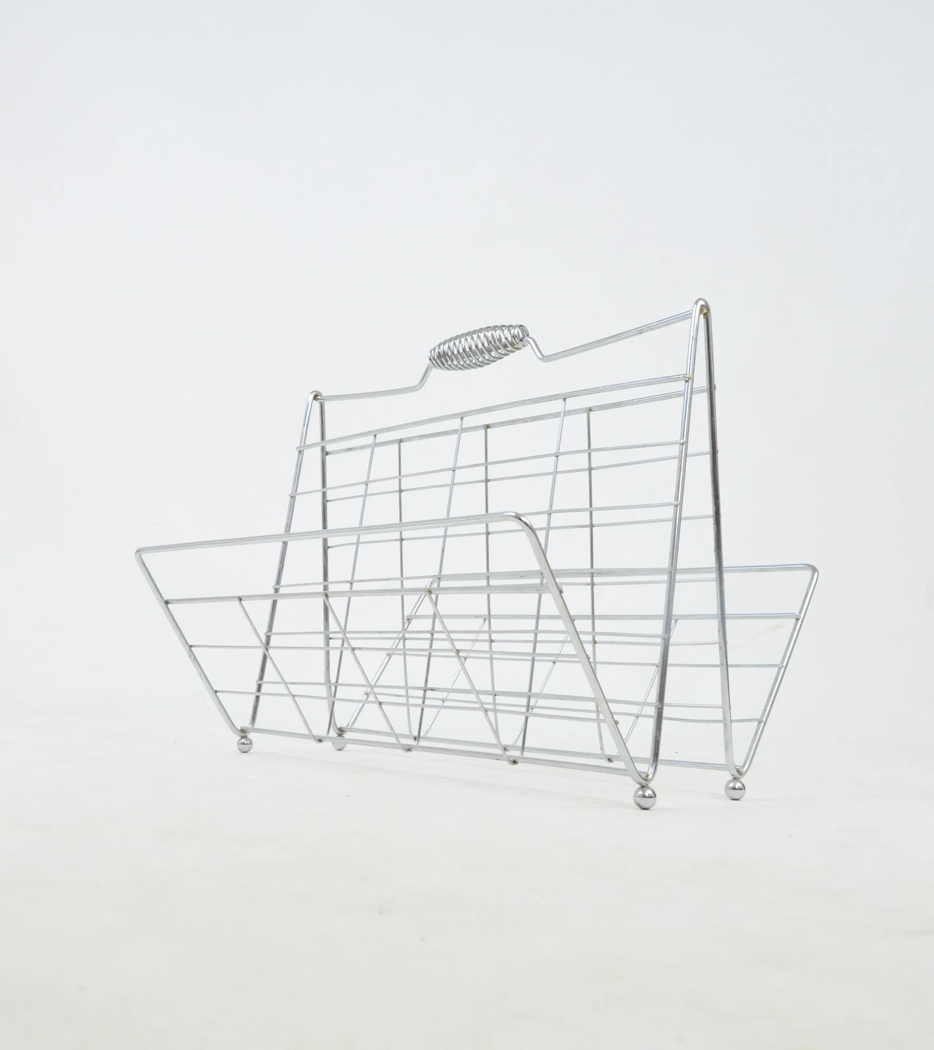 Magazine rack, grey metal, Poland, 1970s. - 85421