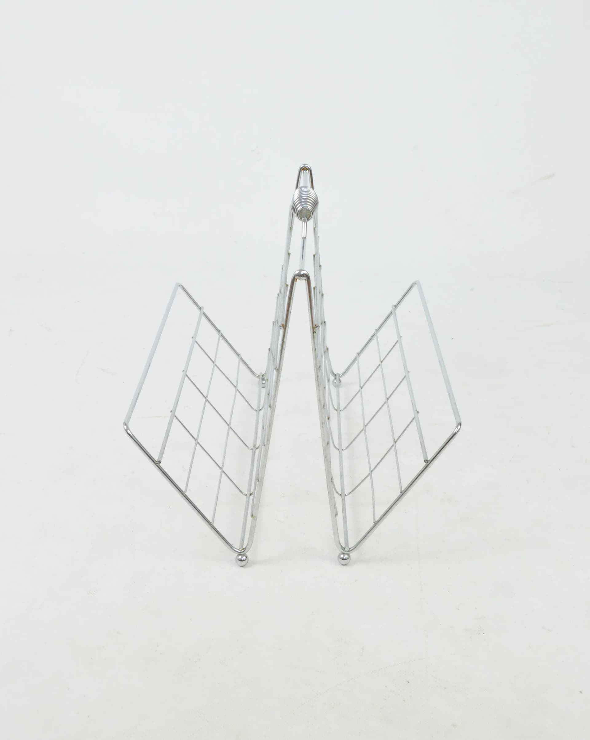 Magazine rack, grey metal, Poland, 1970s. - 85422