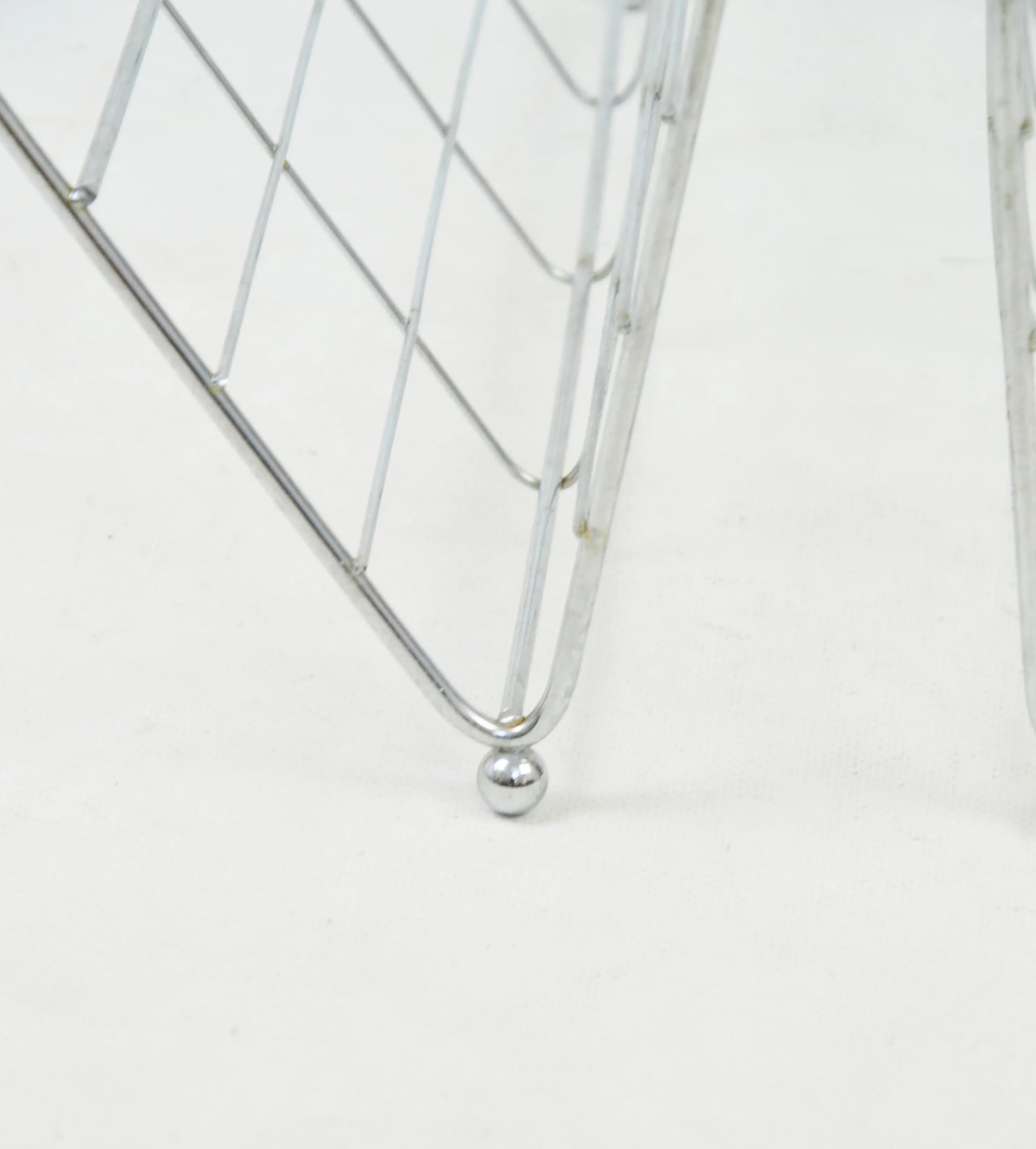 Magazine rack, grey metal, Poland, 1970s. - 85420