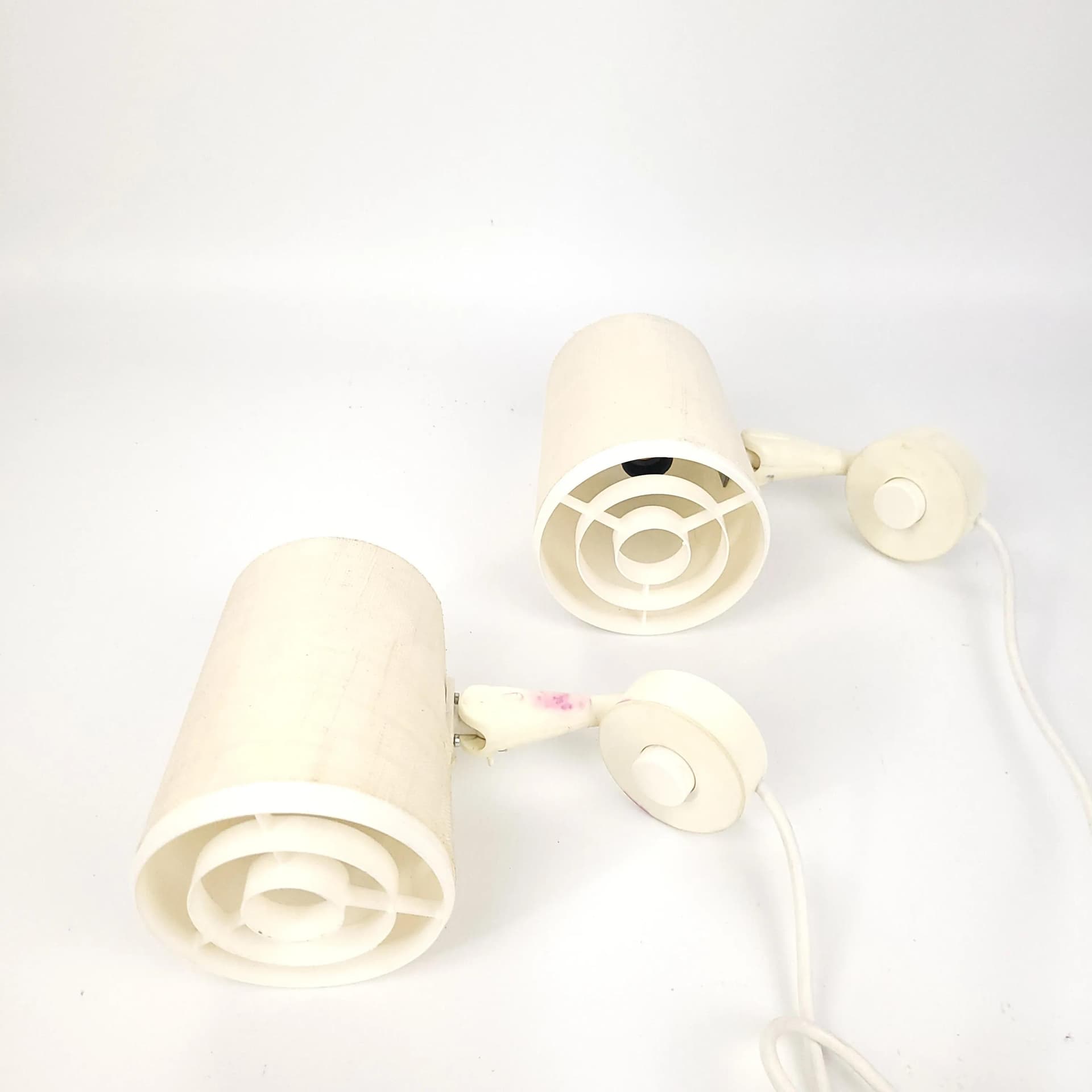 Pair of wall sconces Elidus, ivory white, fabric, metal, plastic, Sweden, 1970s. - 85401