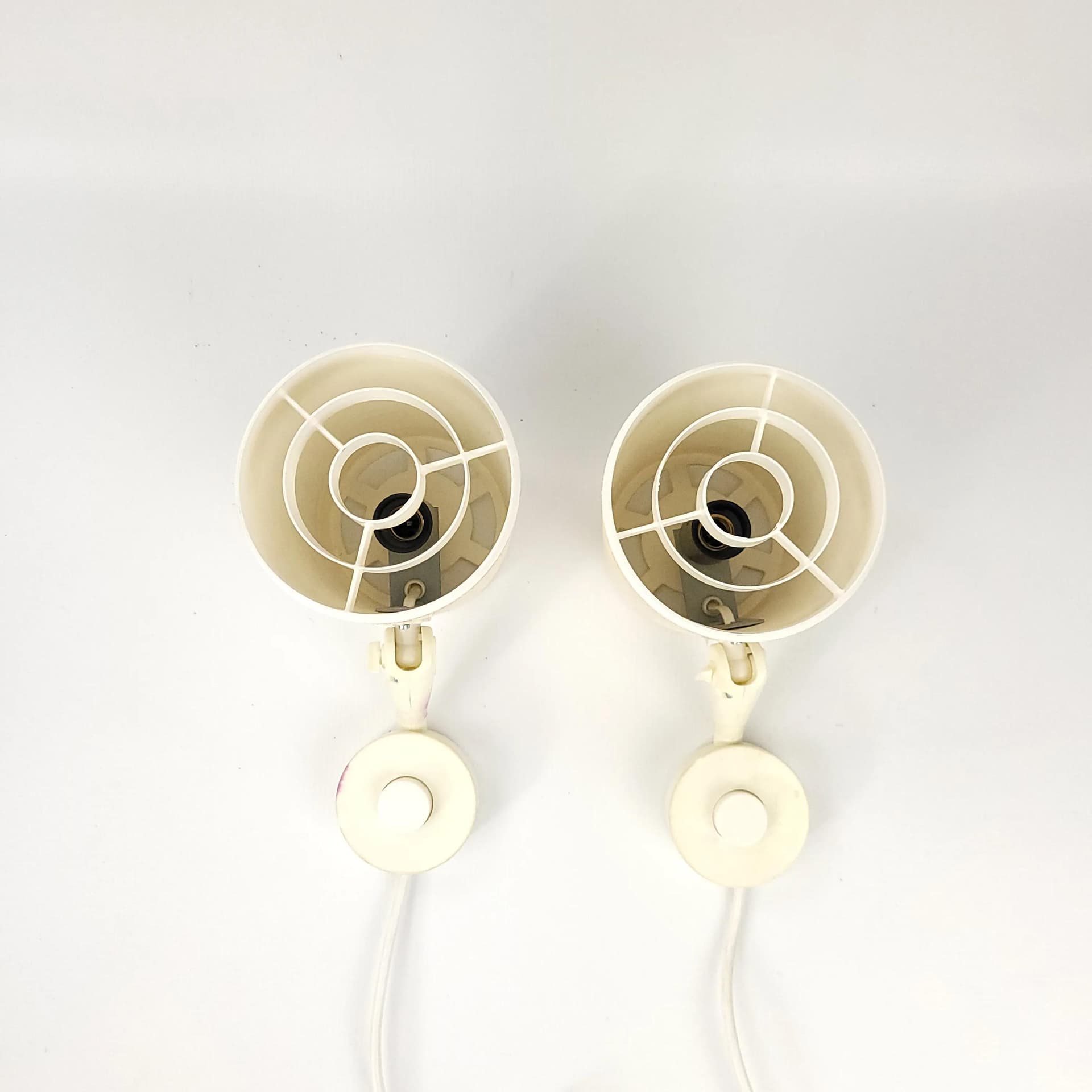 Pair of wall sconces Elidus, ivory white, fabric, metal, plastic, Sweden, 1970s. - 85406