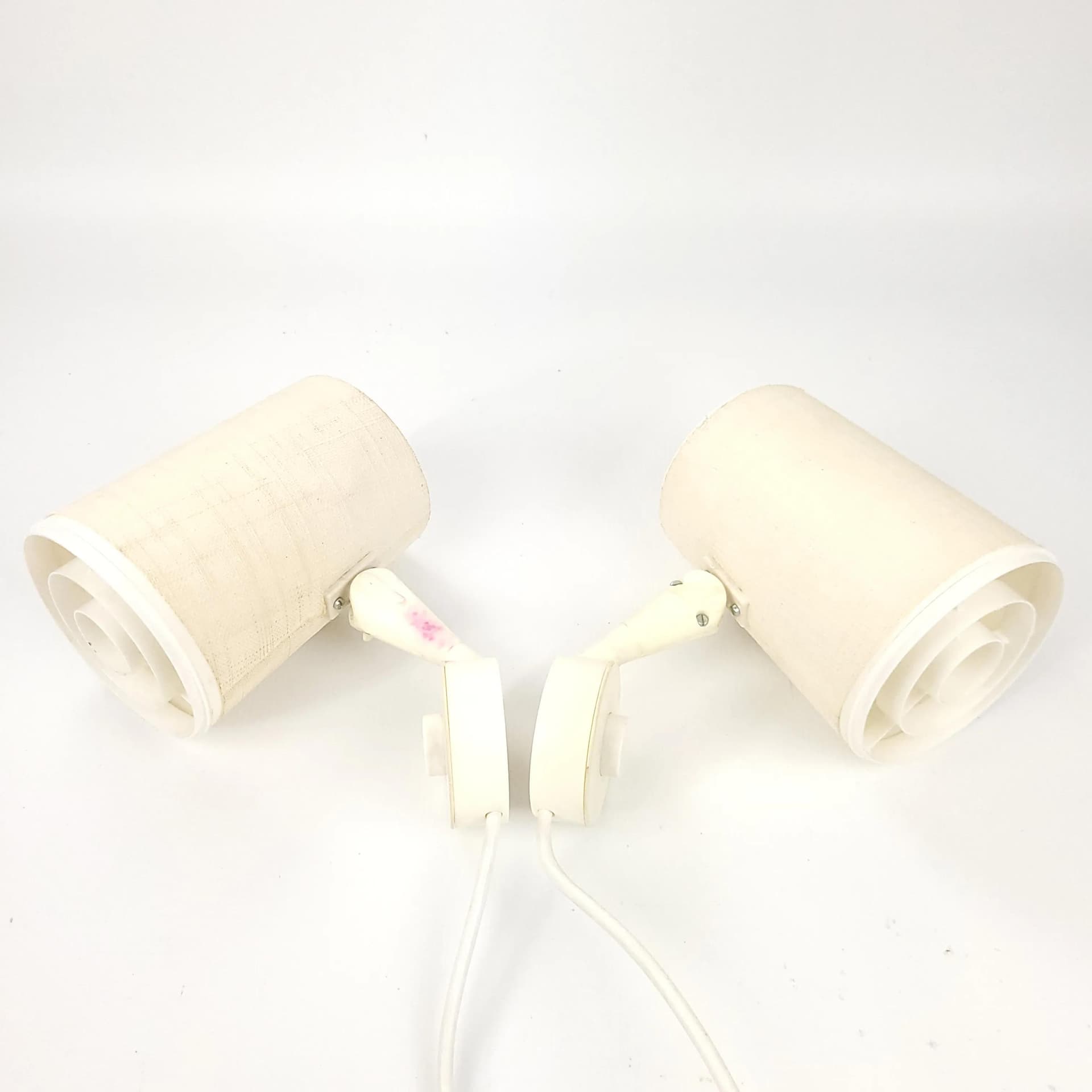Pair of wall sconces Elidus, ivory white, fabric, metal, plastic, Sweden, 1970s. - 85399