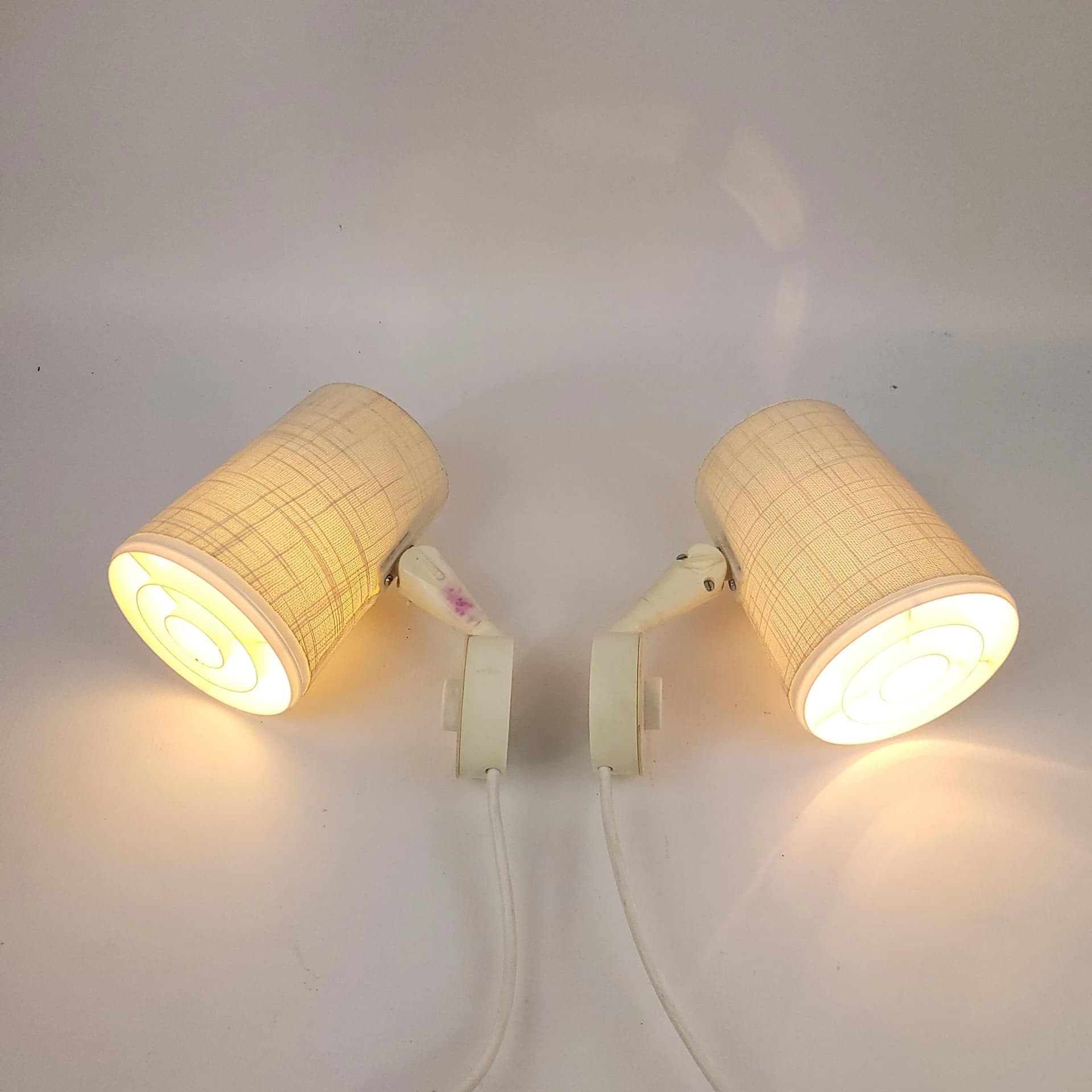 Pair of wall sconces Elidus, ivory white, fabric, metal, plastic, Sweden, 1970s. - 85404