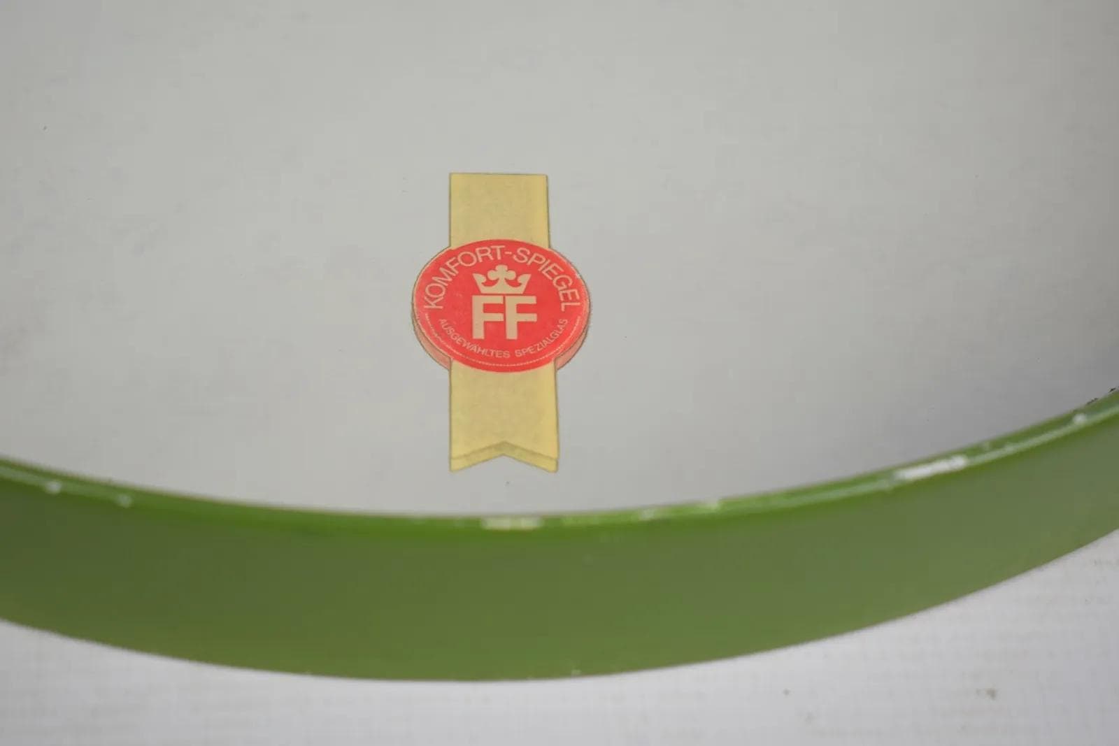 Wall mirror round, olive green acrylic, Poland, 1970s. - 84819