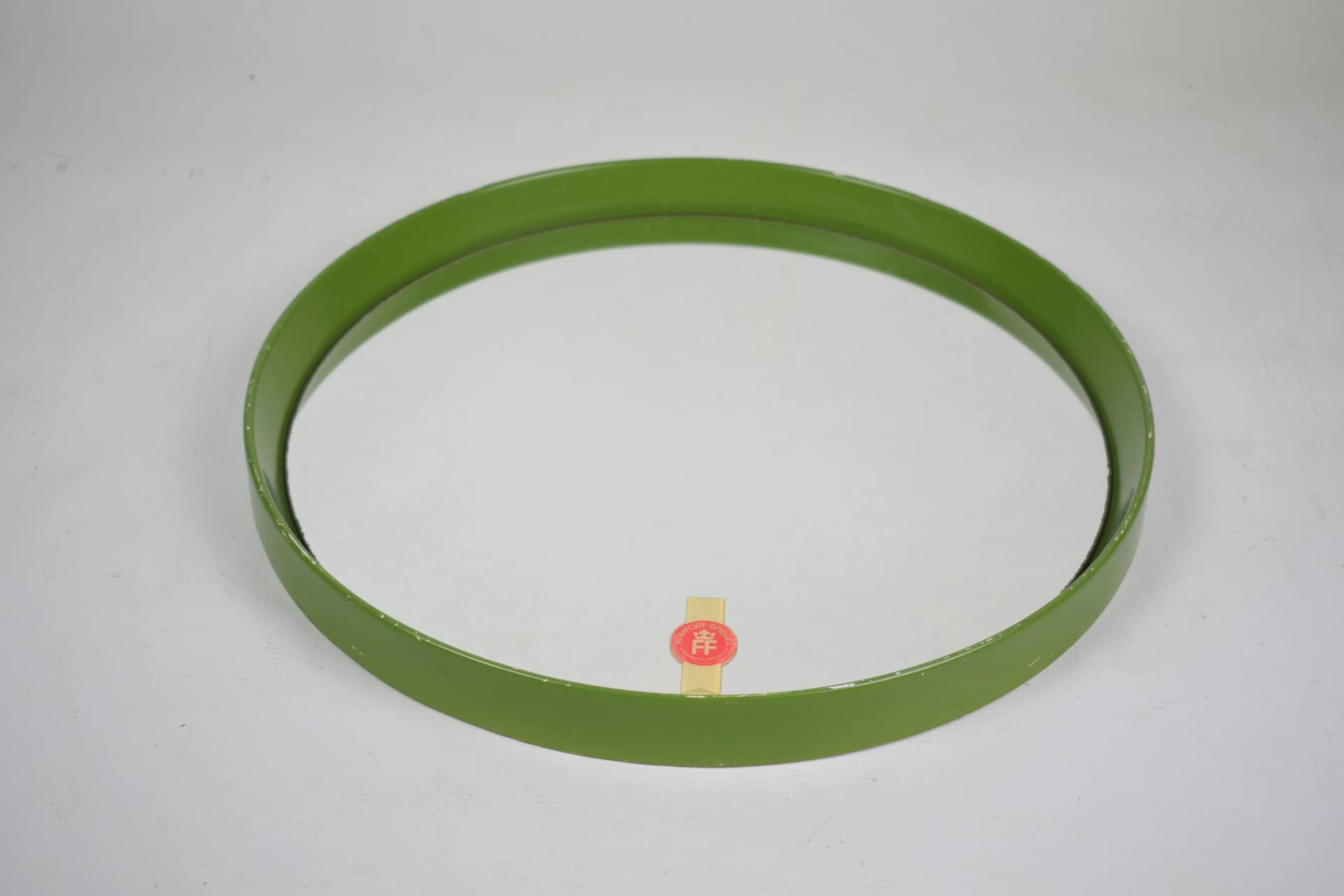 Wall mirror round, olive green acrylic, Poland, 1970s. - 84822
