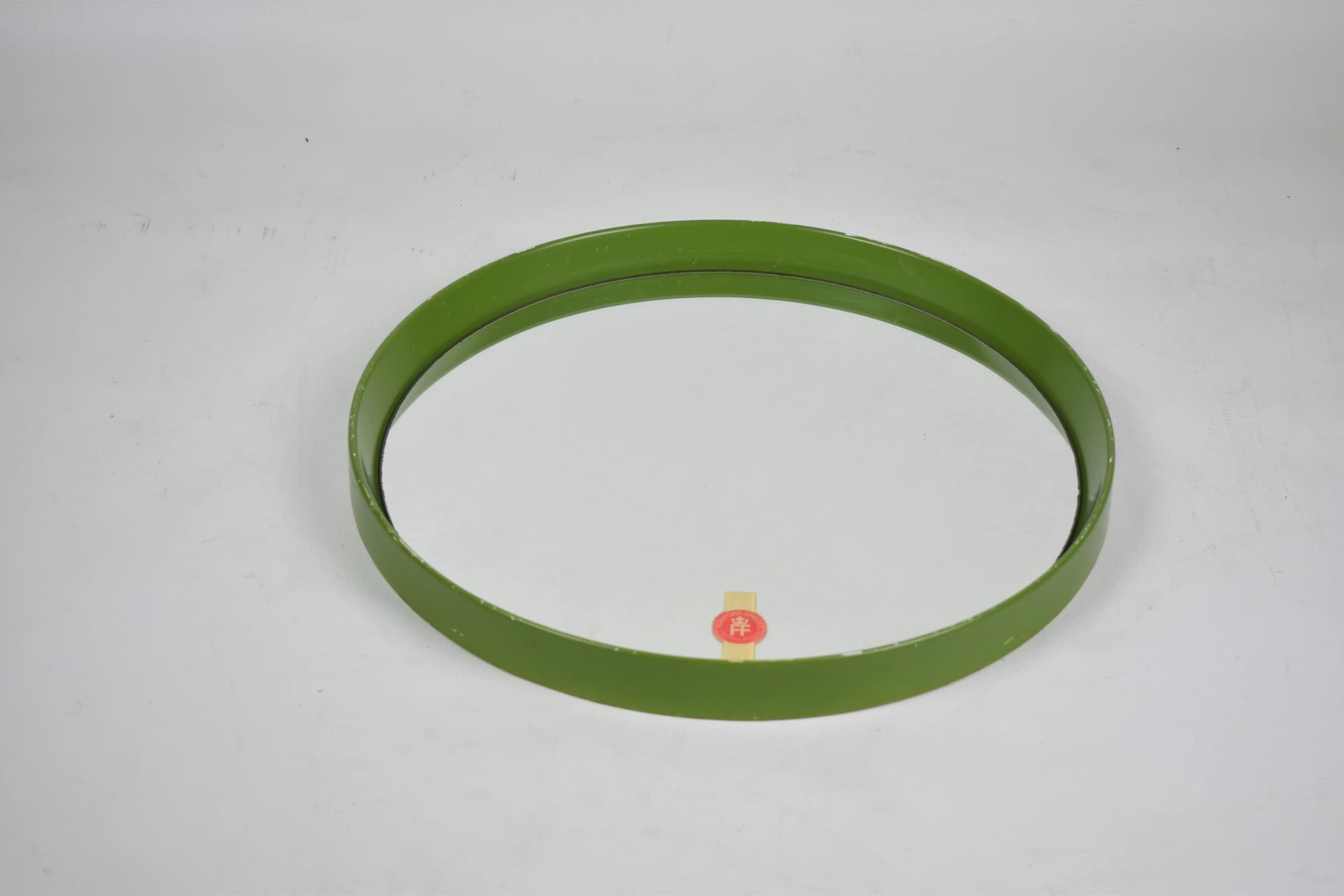 Wall mirror round, olive green acrylic, Poland, 1970s. - 84820