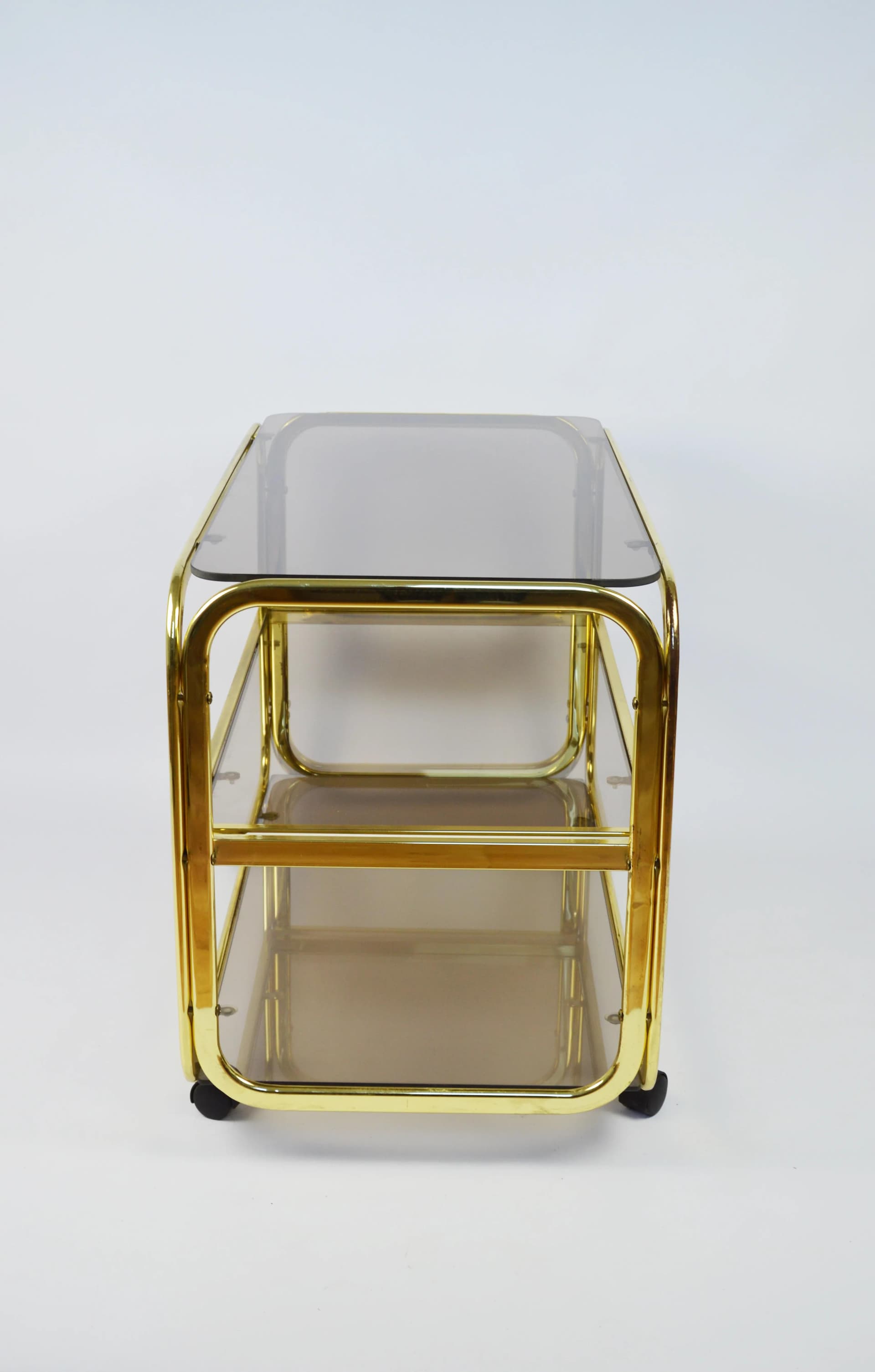 Mobile side table, golden metal, Poland, 1980s. - 84582