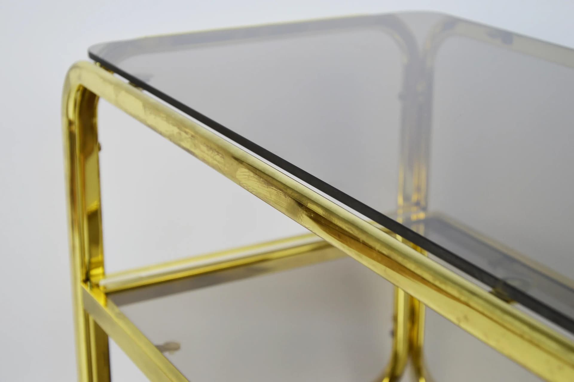 Mobile side table, golden metal, Poland, 1980s. - 84585