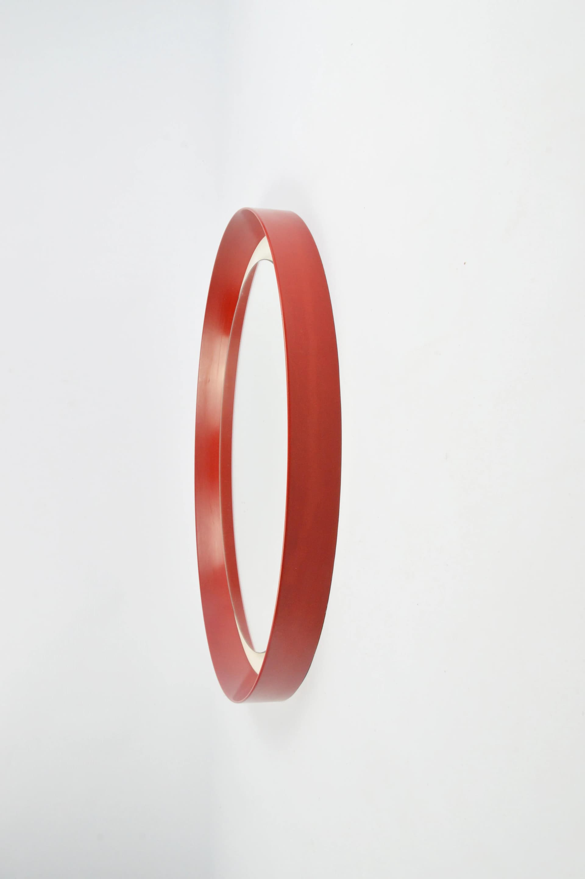 Round mirror, red plastic, Poland, 1970s. - 84188