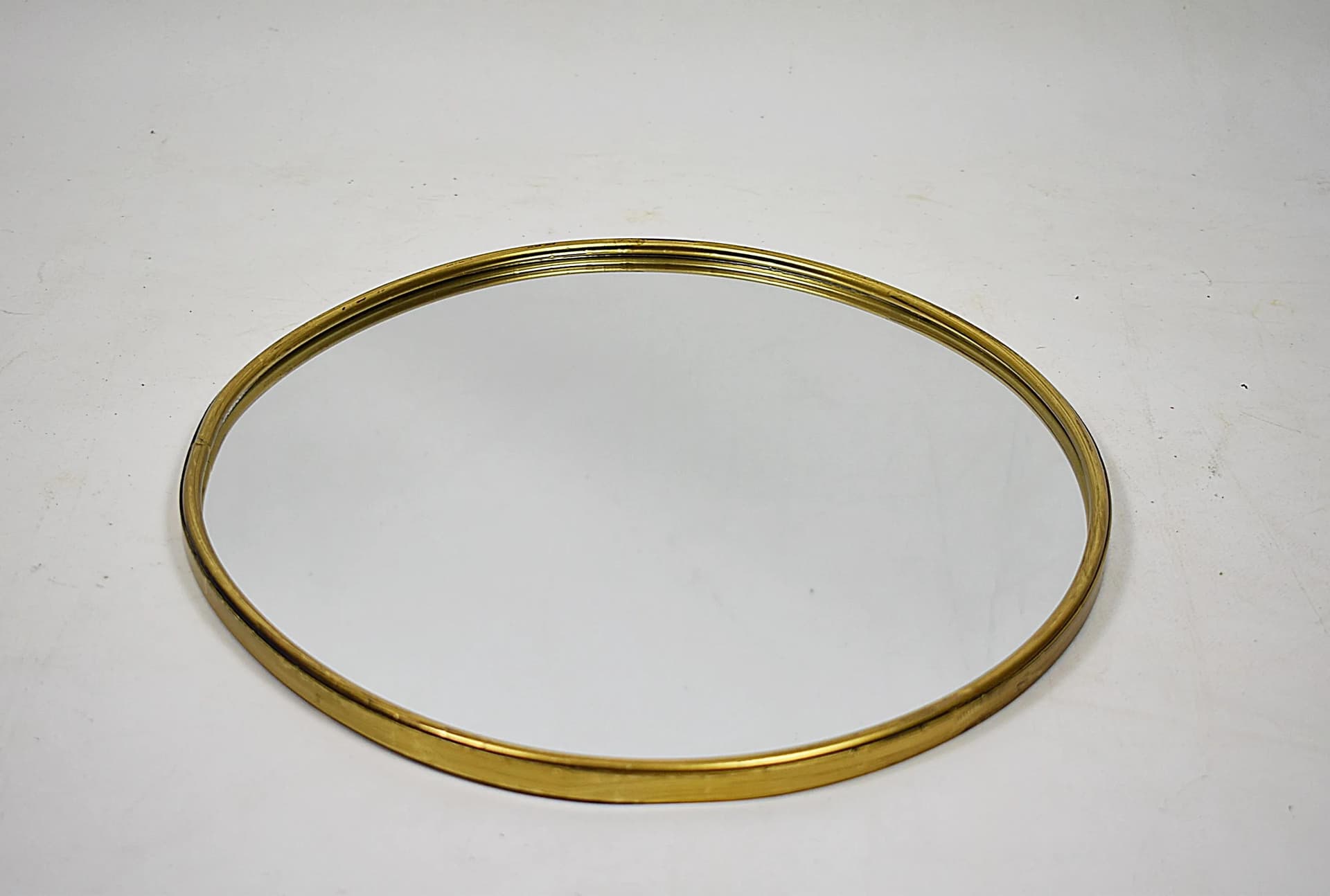 Wall mirror, oval, golden brass, Poland, 1980s - 84142
