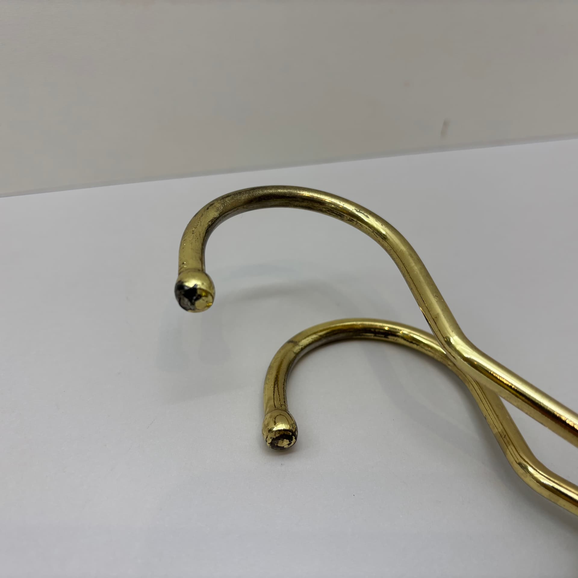 Para wieszaków, stal złocona, tworzywo czarne, Niemcy, lata 70. - 90824