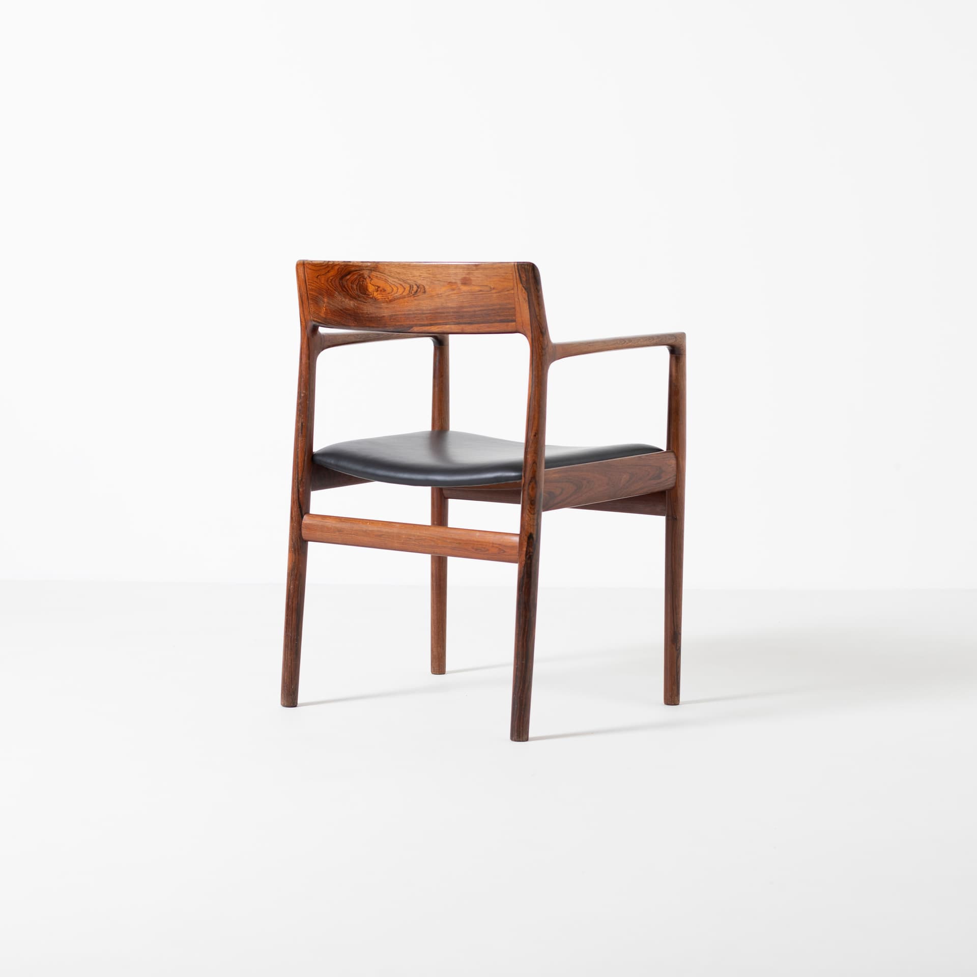 Armchair, brown rosewood, black leather, by J. Norgaard, Denmark, 1960s. - 93930