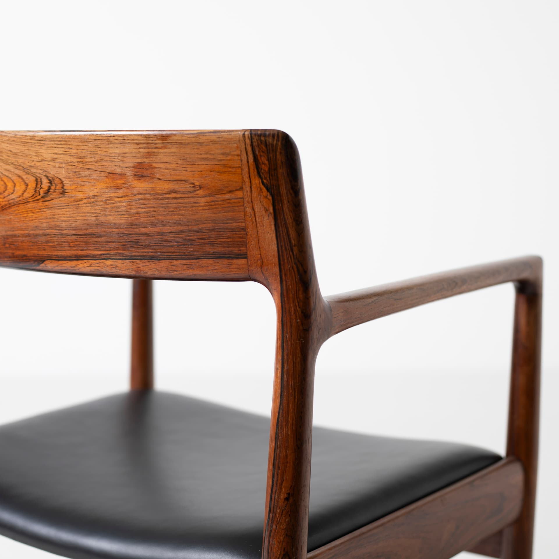 Armchair, brown rosewood, black leather, by J. Norgaard, Denmark, 1960s. - 93933