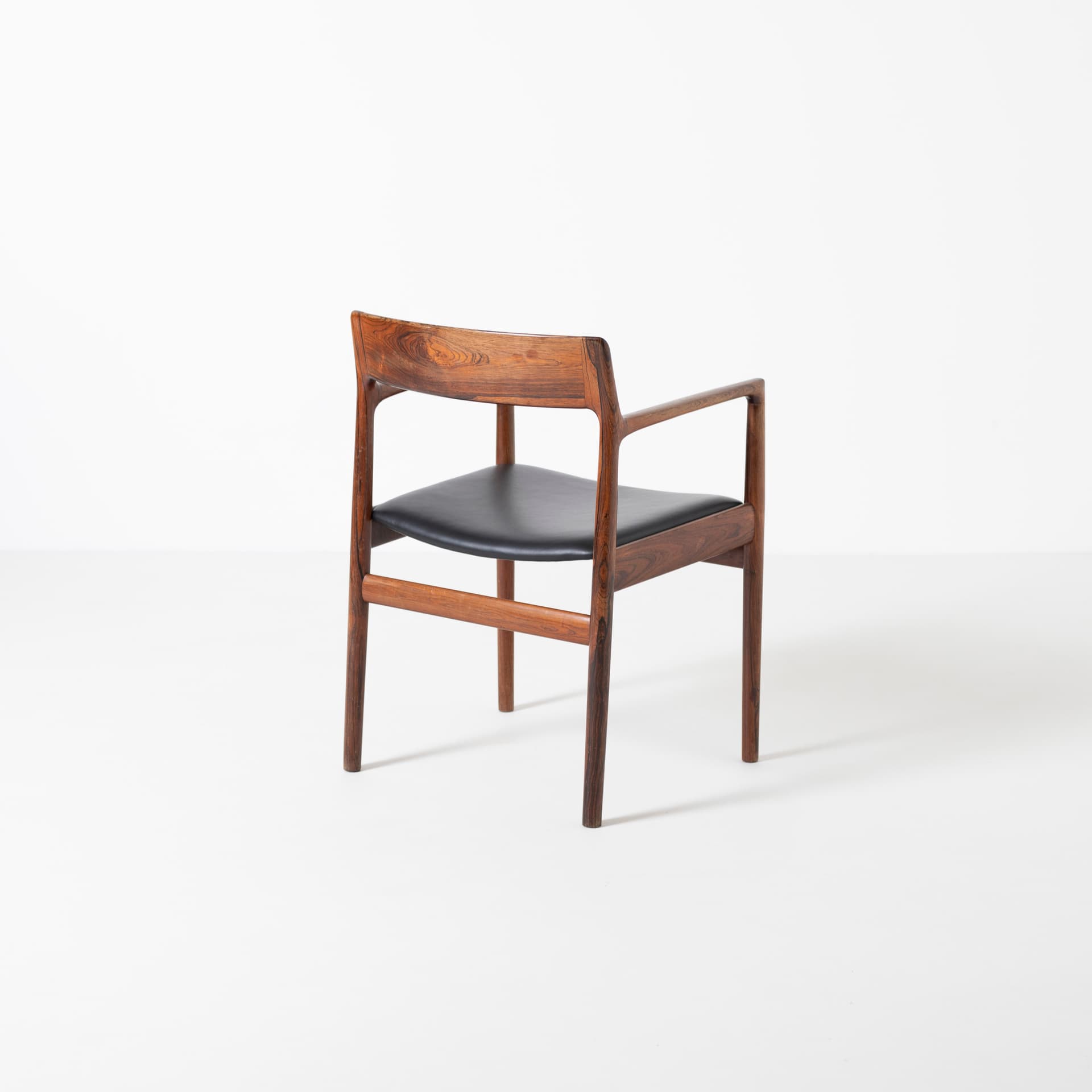 Armchair, brown rosewood, black leather, by J. Norgaard, Denmark, 1960s. - 93929