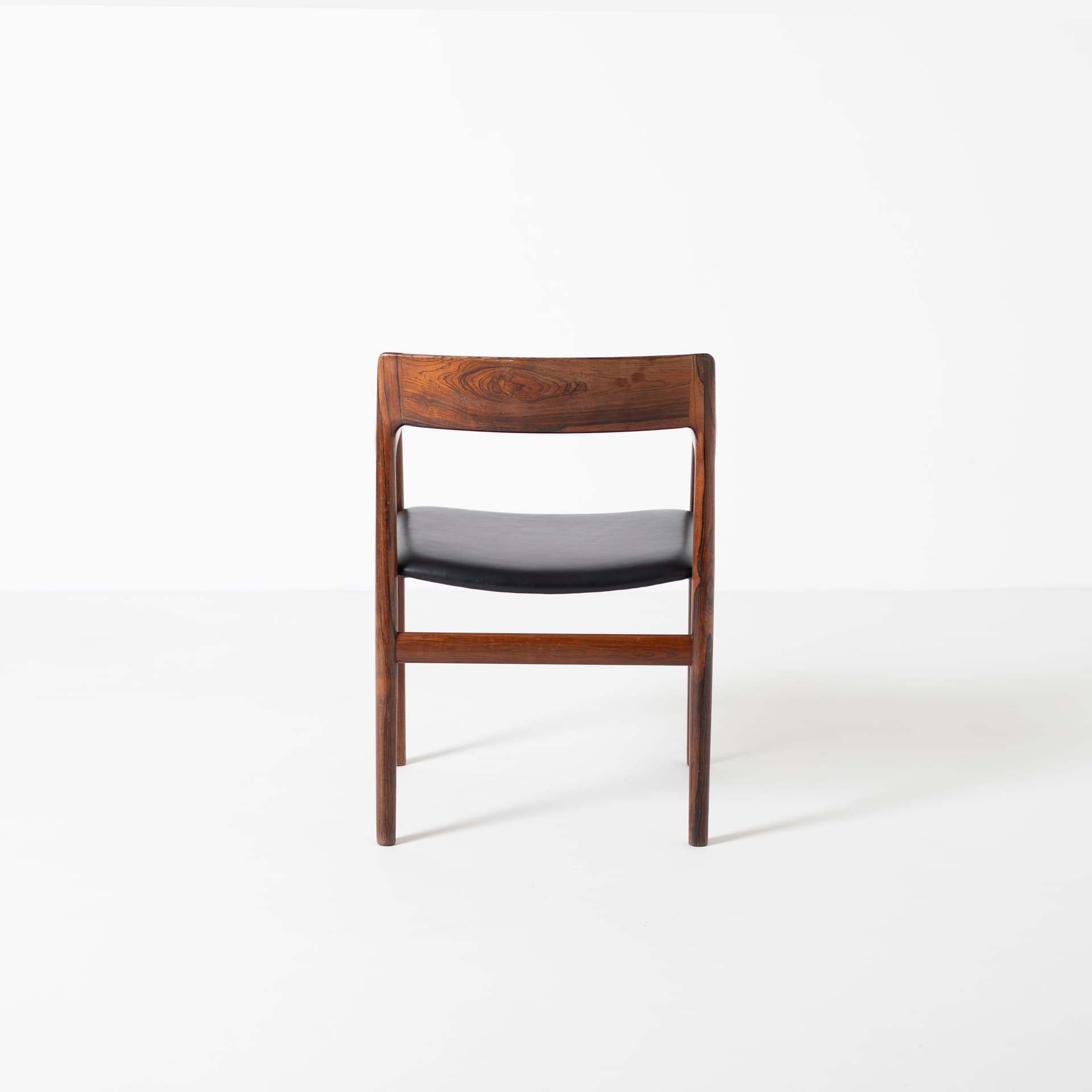 Armchair, brown rosewood, black leather, by J. Norgaard, Denmark, 1960s. - 93931