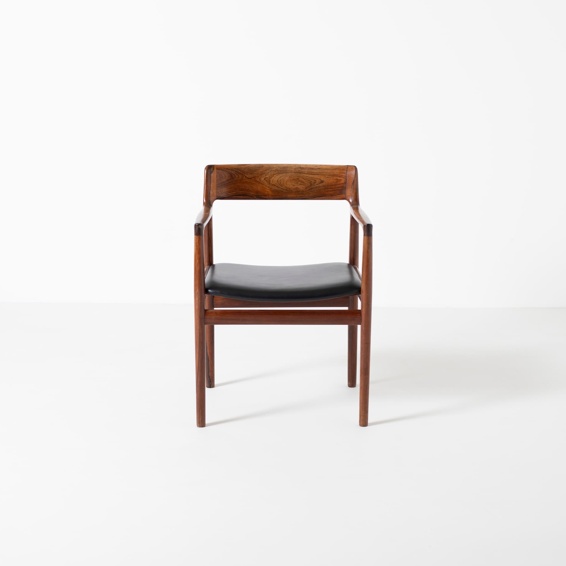 Armchair, brown rosewood, black leather, by J. Norgaard, Denmark, 1960s. - 93927