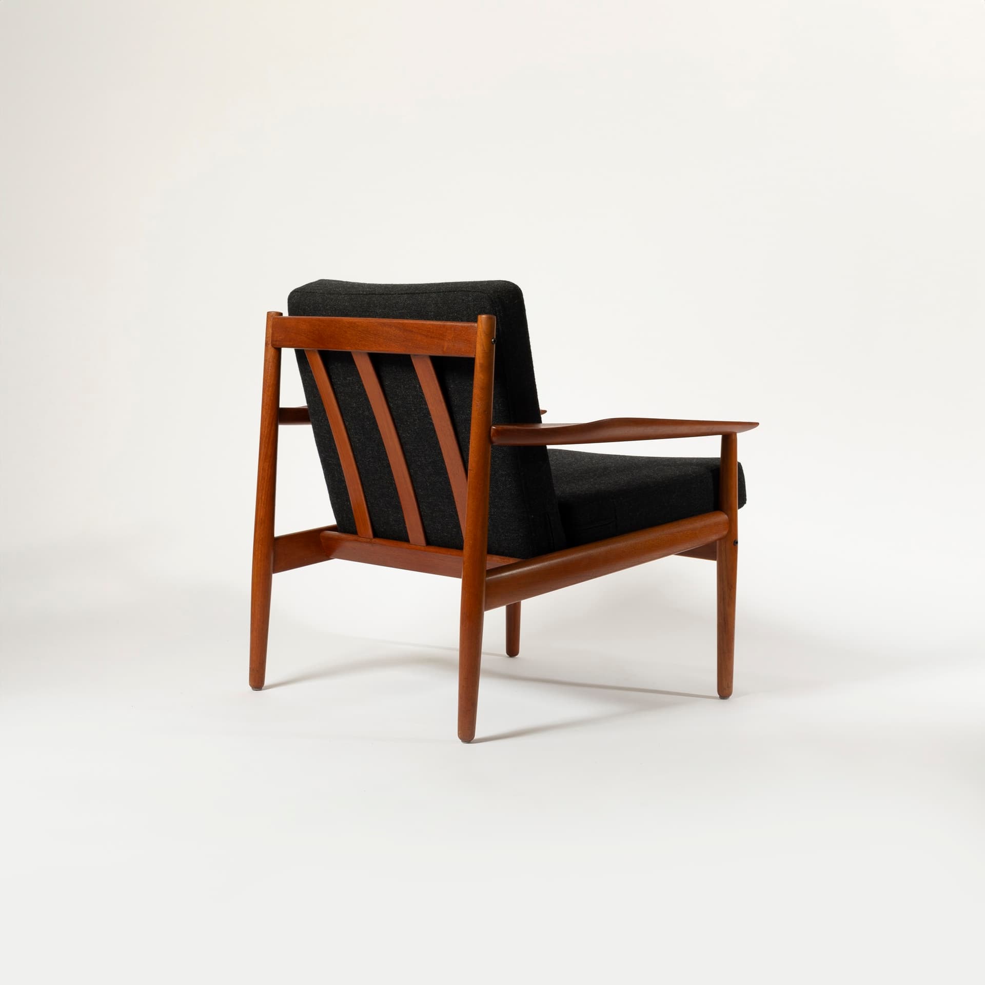 Armchair, black wool, teak, by A. Vodder, Glostrup Møbelfabrik, Denmark, 1960s. - 95516