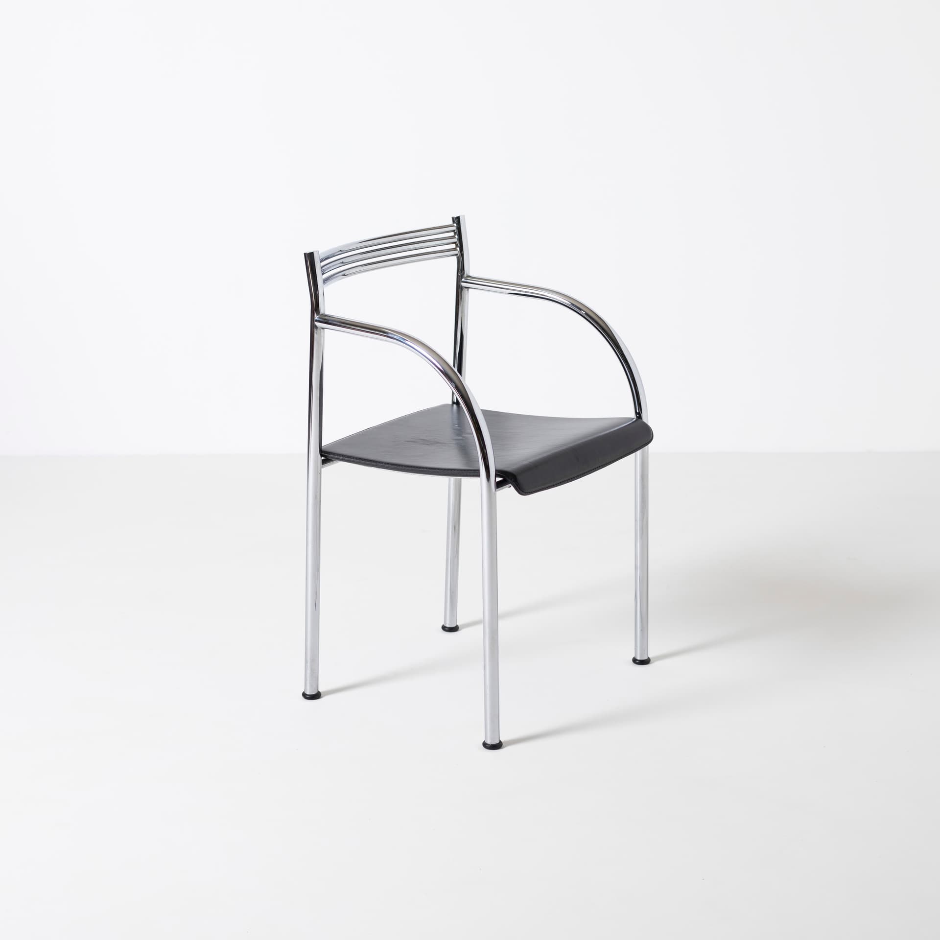 Komplet czterech krzeseł Francesca Spanish, skóra czarna, stal chromowana, proj. P. Starck, Baleri, Włochy, lata 80. - 96123