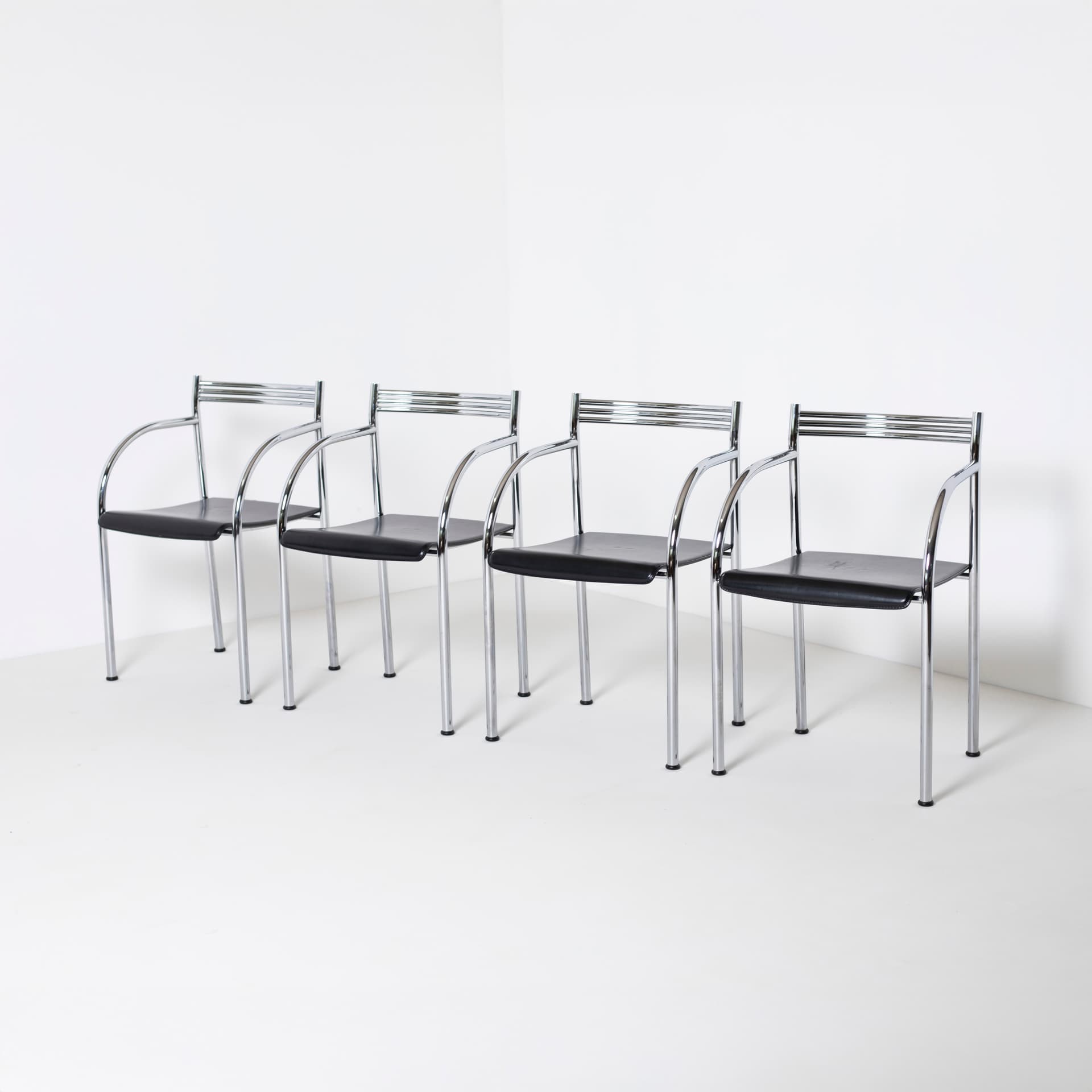 Komplet czterech krzeseł Francesca Spanish, skóra czarna, stal chromowana, proj. P. Starck, Baleri, Włochy, lata 80. - 96120