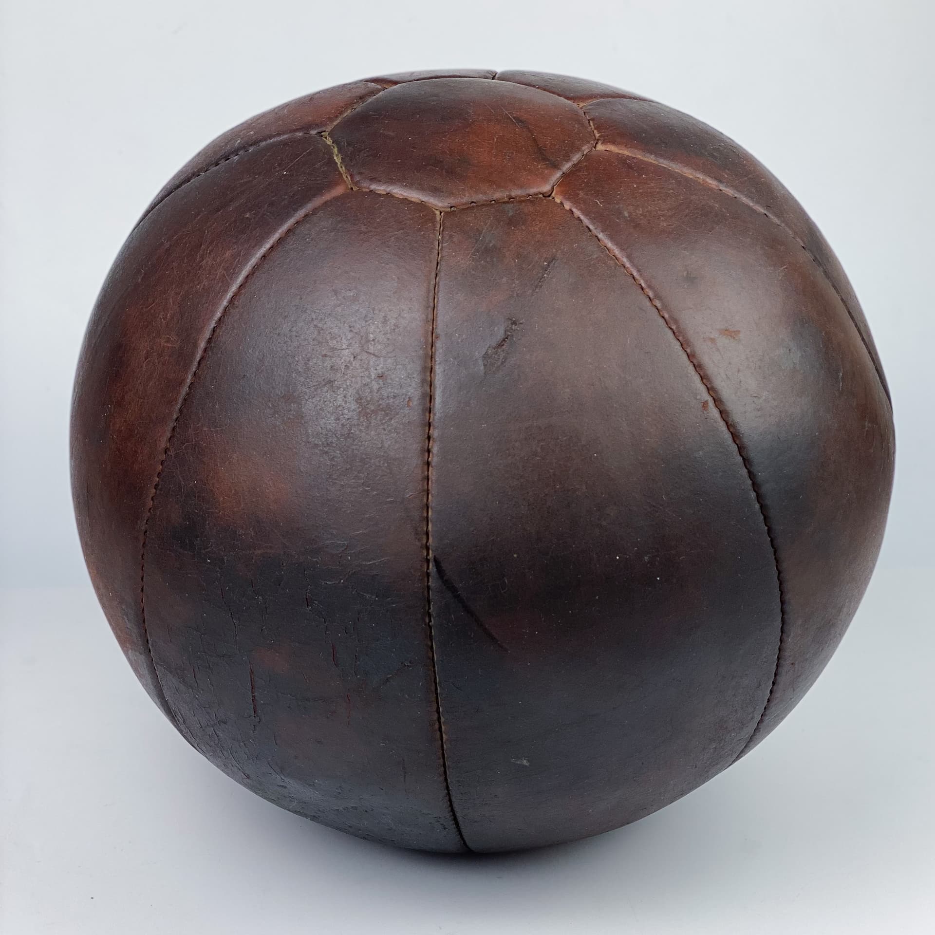 Medicine ball, dark brown natural leather, Germany, 1960s. - 97023