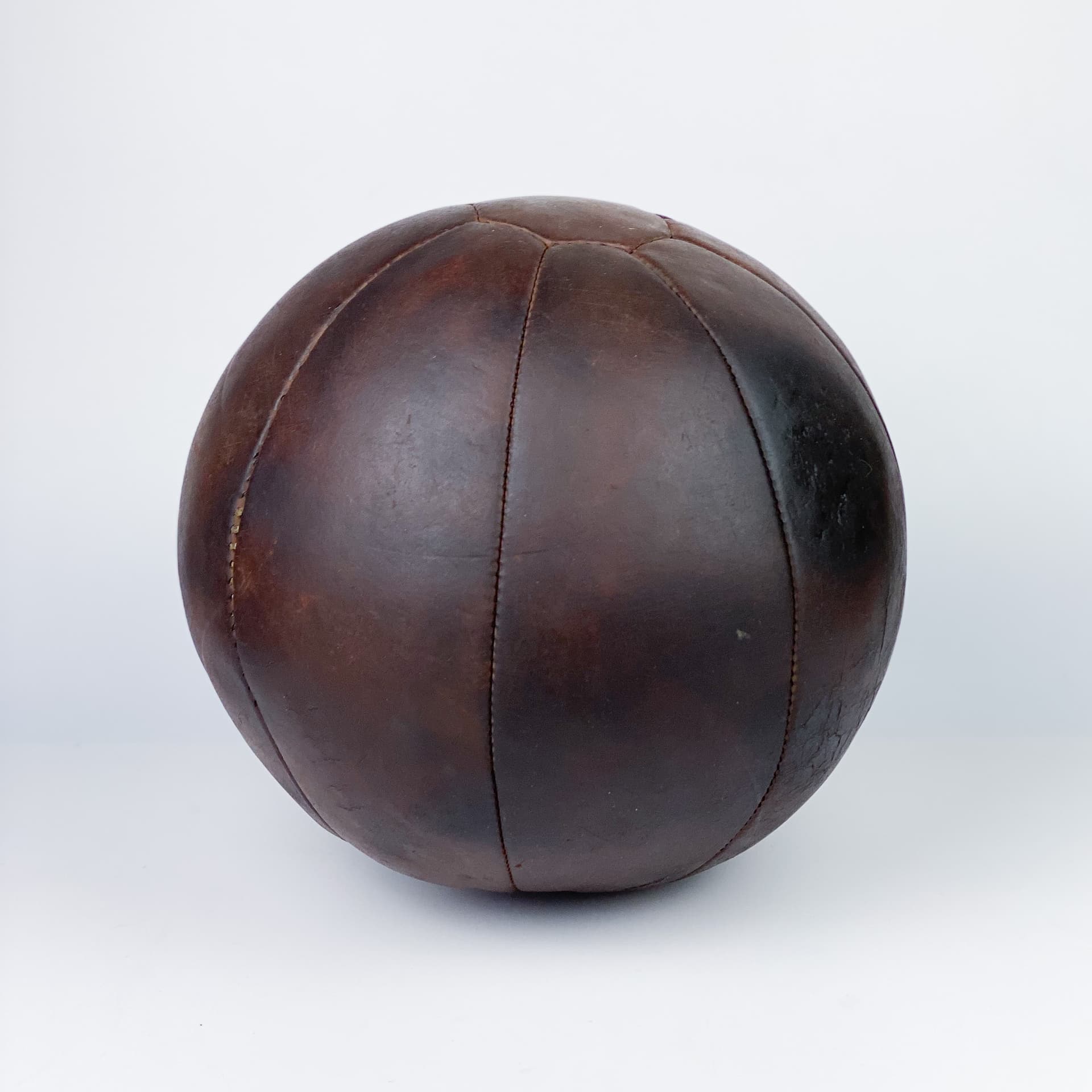Medicine ball, dark brown natural leather, Germany, 1960s. - 97016