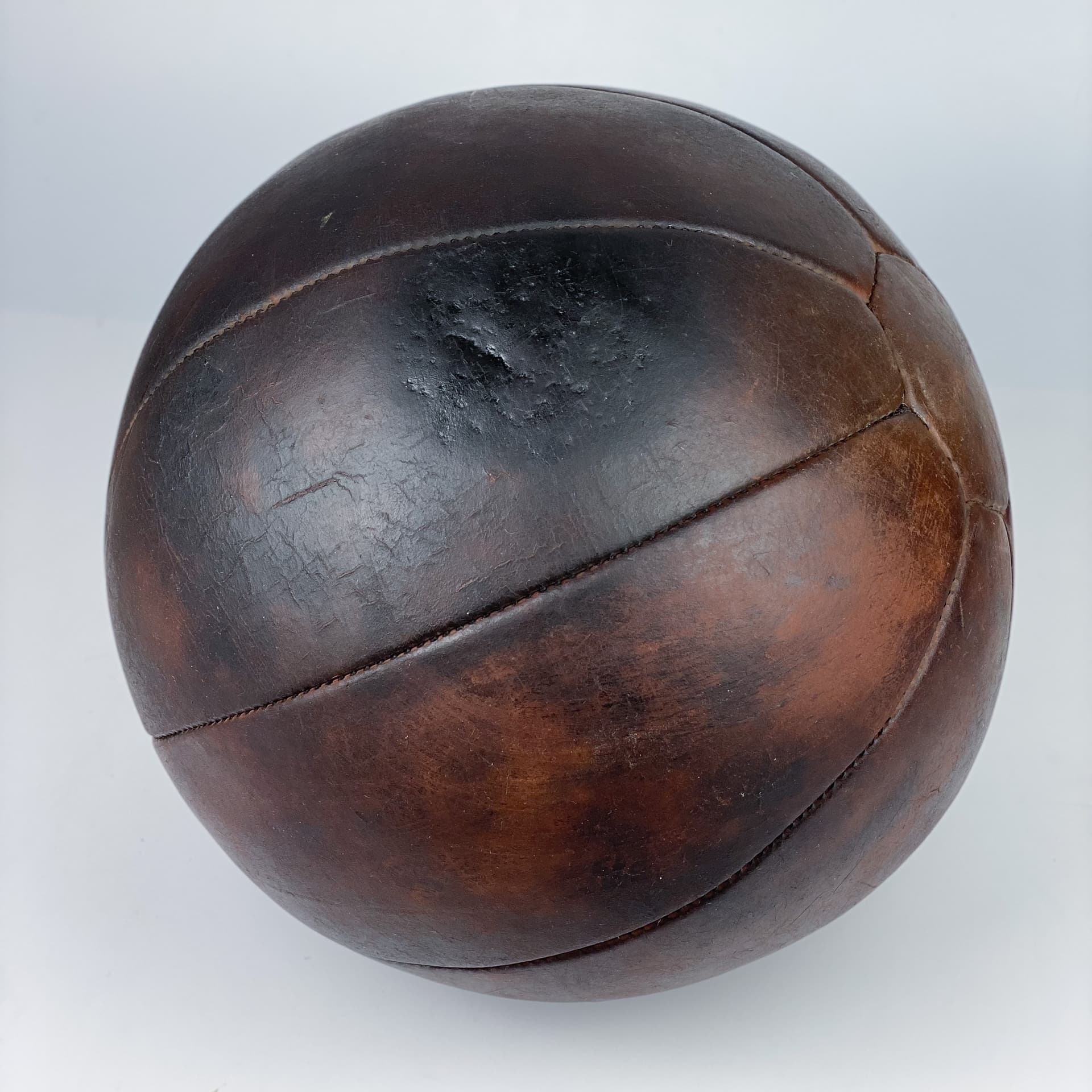 Medicine ball, dark brown natural leather, Germany, 1960s. - 97025