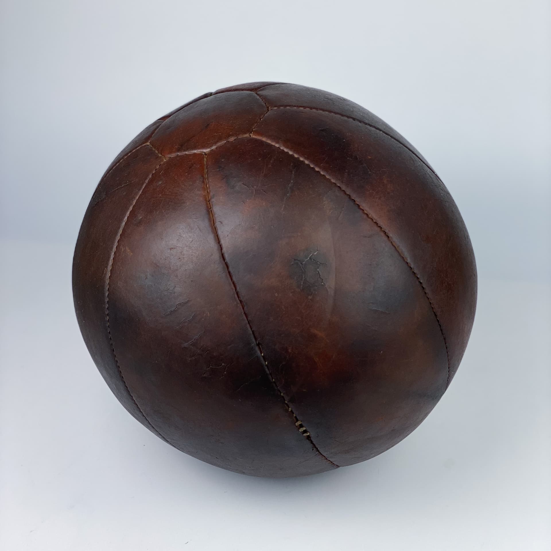 Medicine ball, dark brown natural leather, Germany, 1960s. - 97020