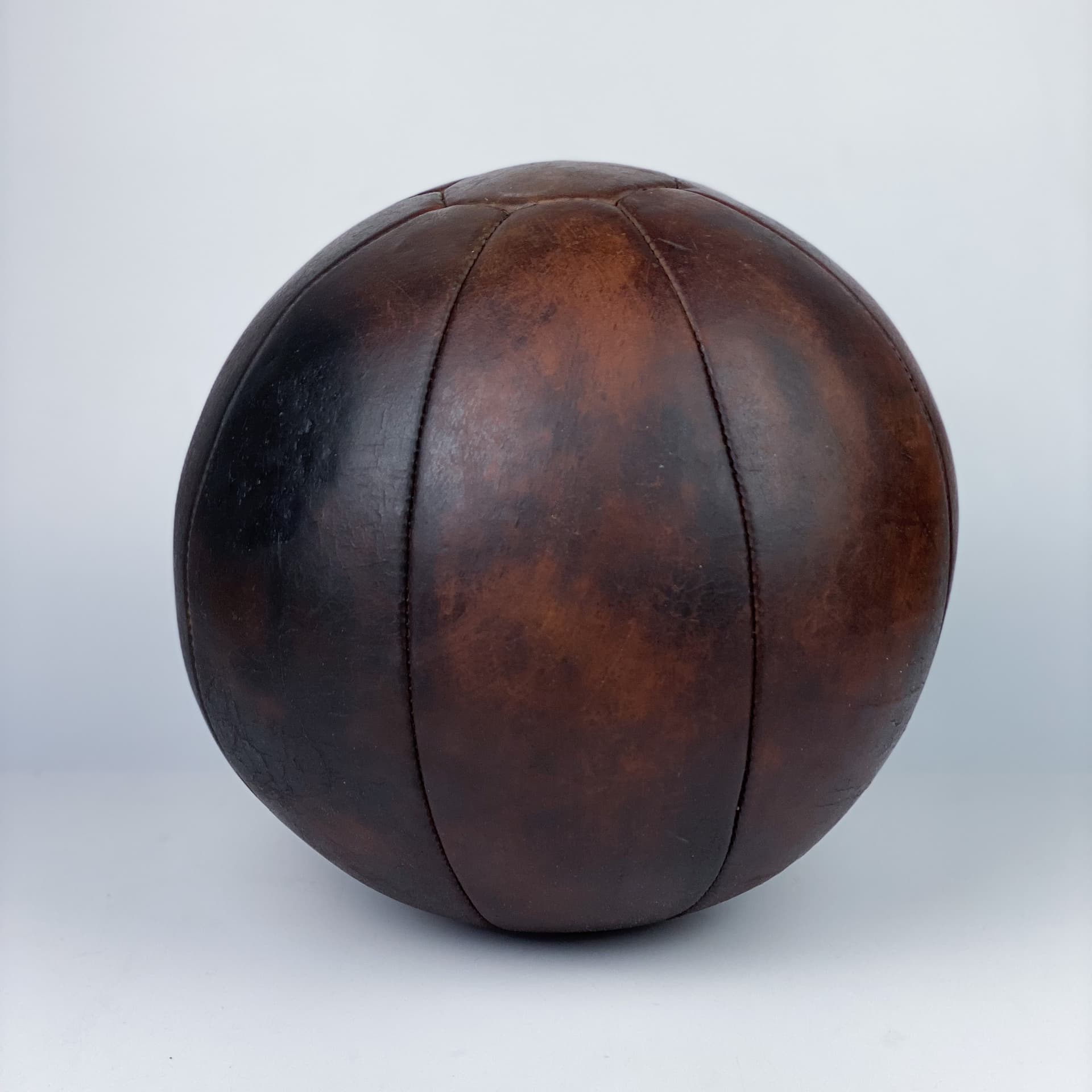 Medicine ball, dark brown natural leather, Germany, 1960s. - 97017