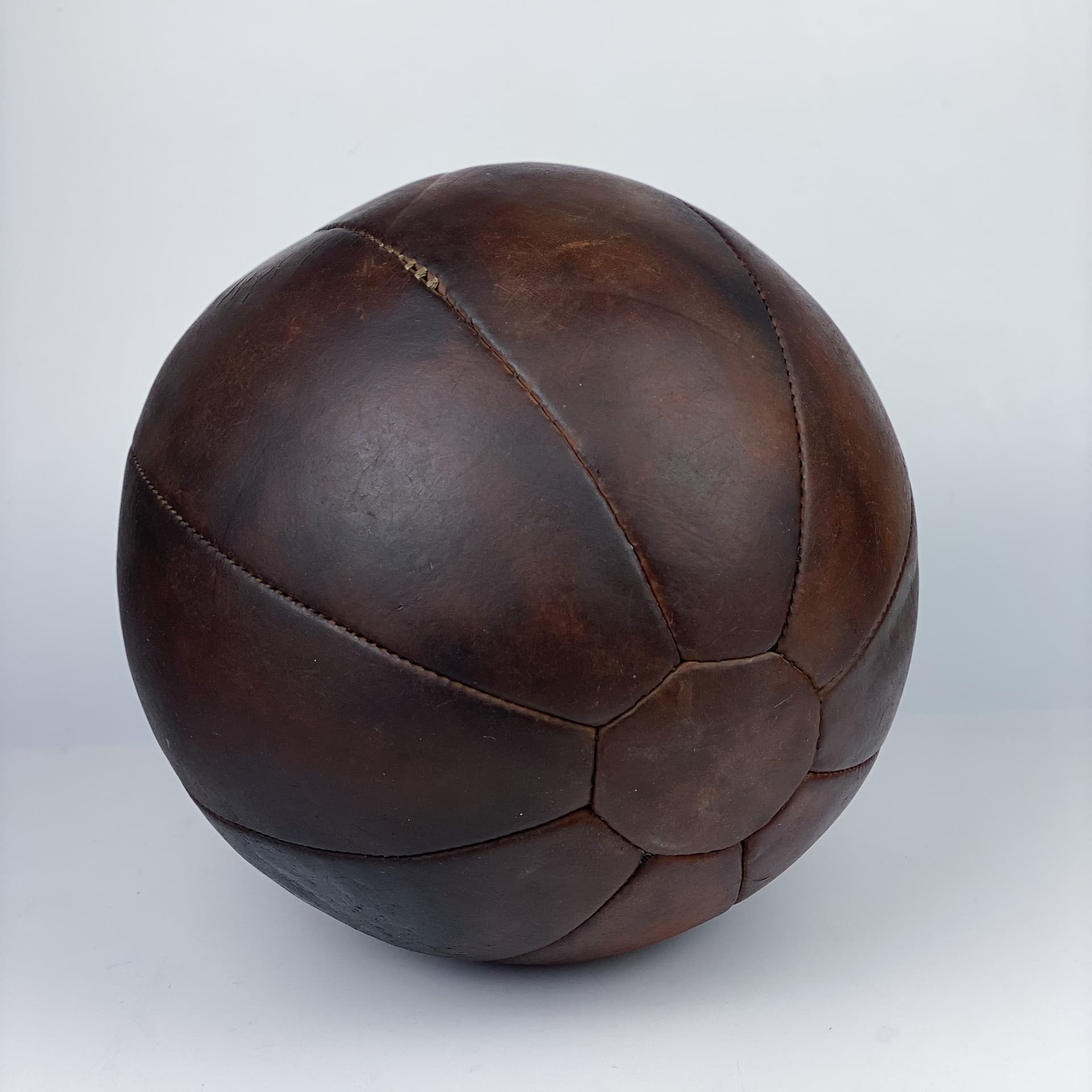 Medicine ball, dark brown natural leather, Germany, 1960s. - 97027