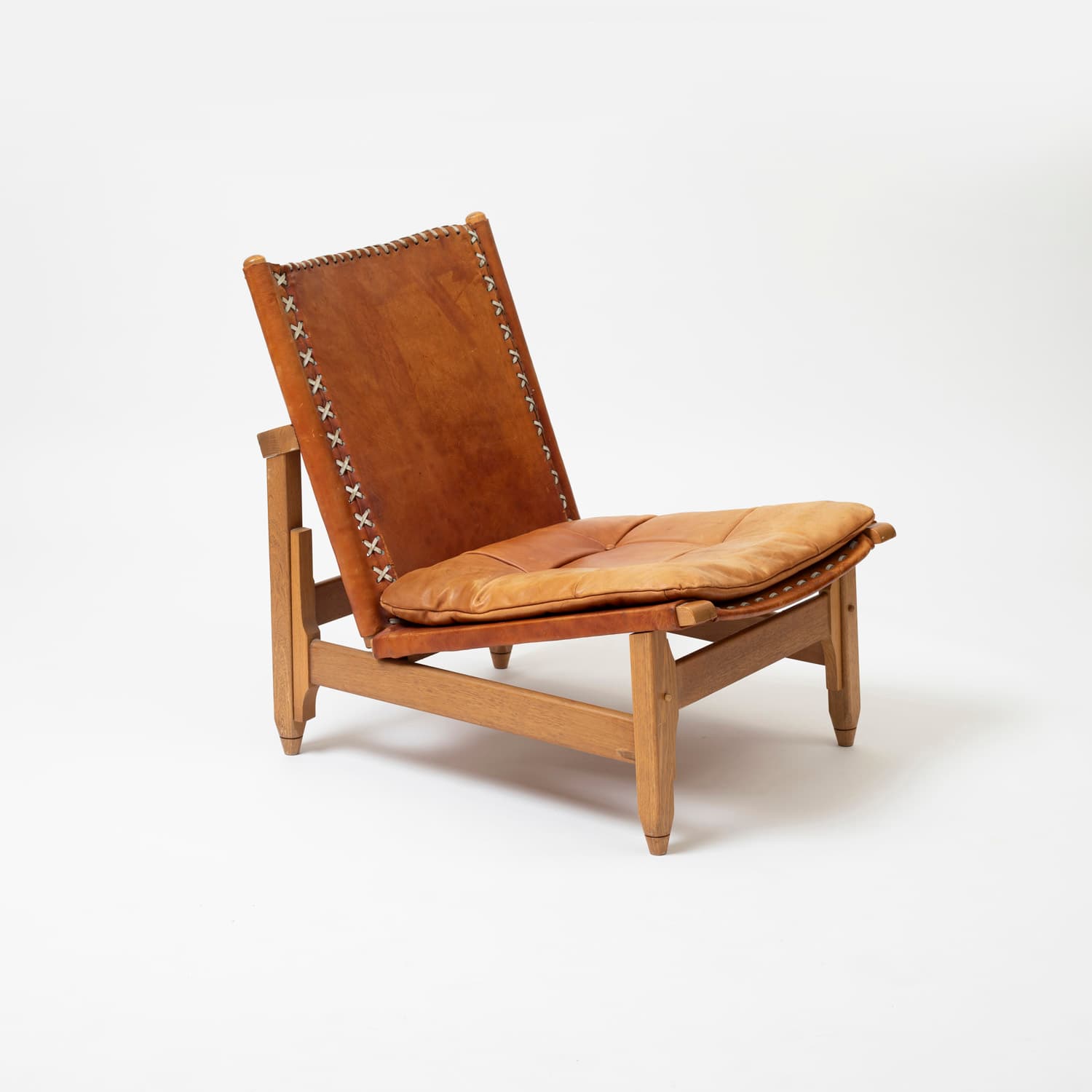 Fotel i stolik, skóra naturalna koniakowa, orzech jasny, proj. W. Biermann, Arte Sano, Kolumbia, lata 60. - 97397