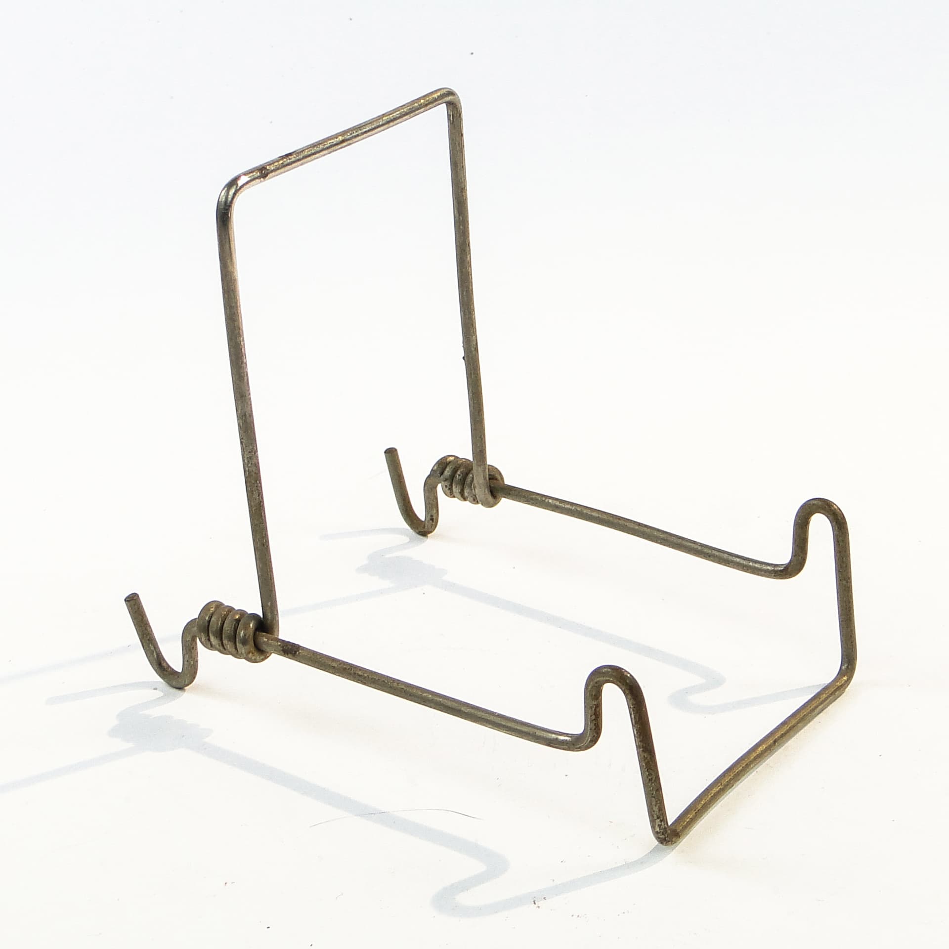 Plate stand, mid-century modern, brown steel, Poland, 1950s. - 98778