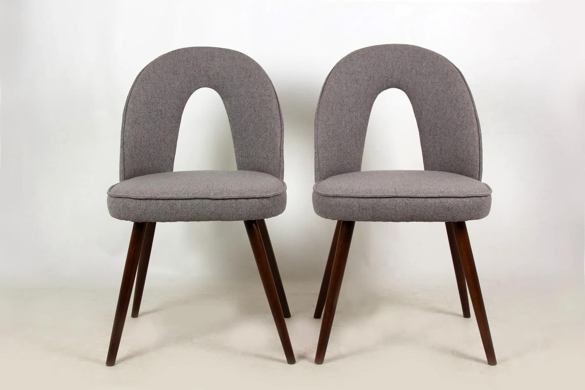 Pair of chairs, grey fabric, brown wood, by A. Šuman, Czech Republic, 1960s. - 98335