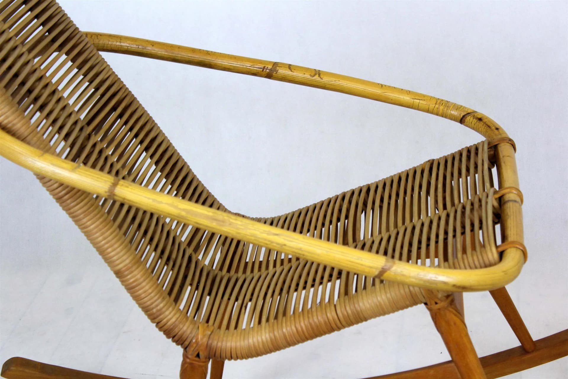 Rocking chair, brown rattan, wood, Czechoslovakia, 1960s. - 98444