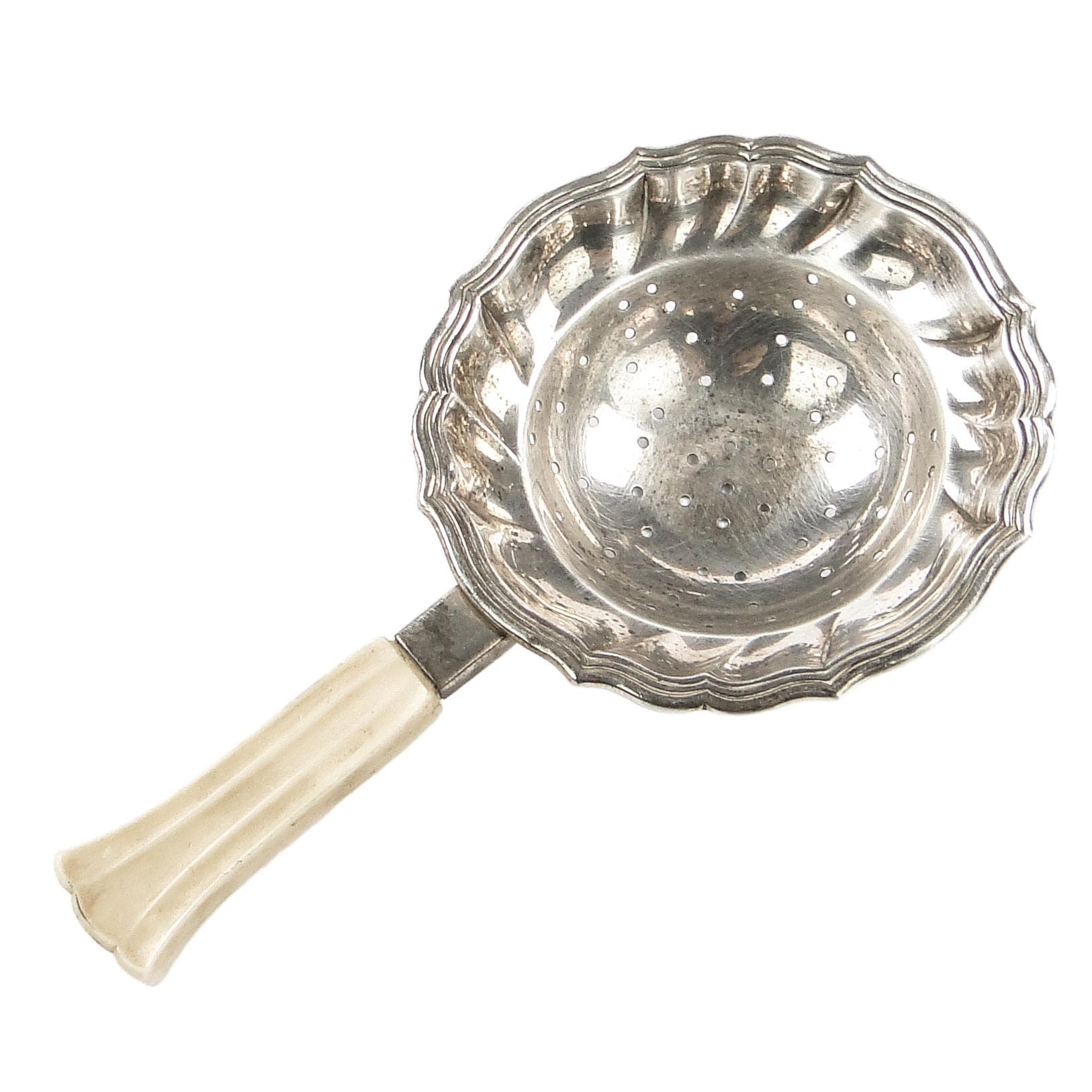 Art Nouveau tea strainer, bovine bone, Germany, early 20th c.