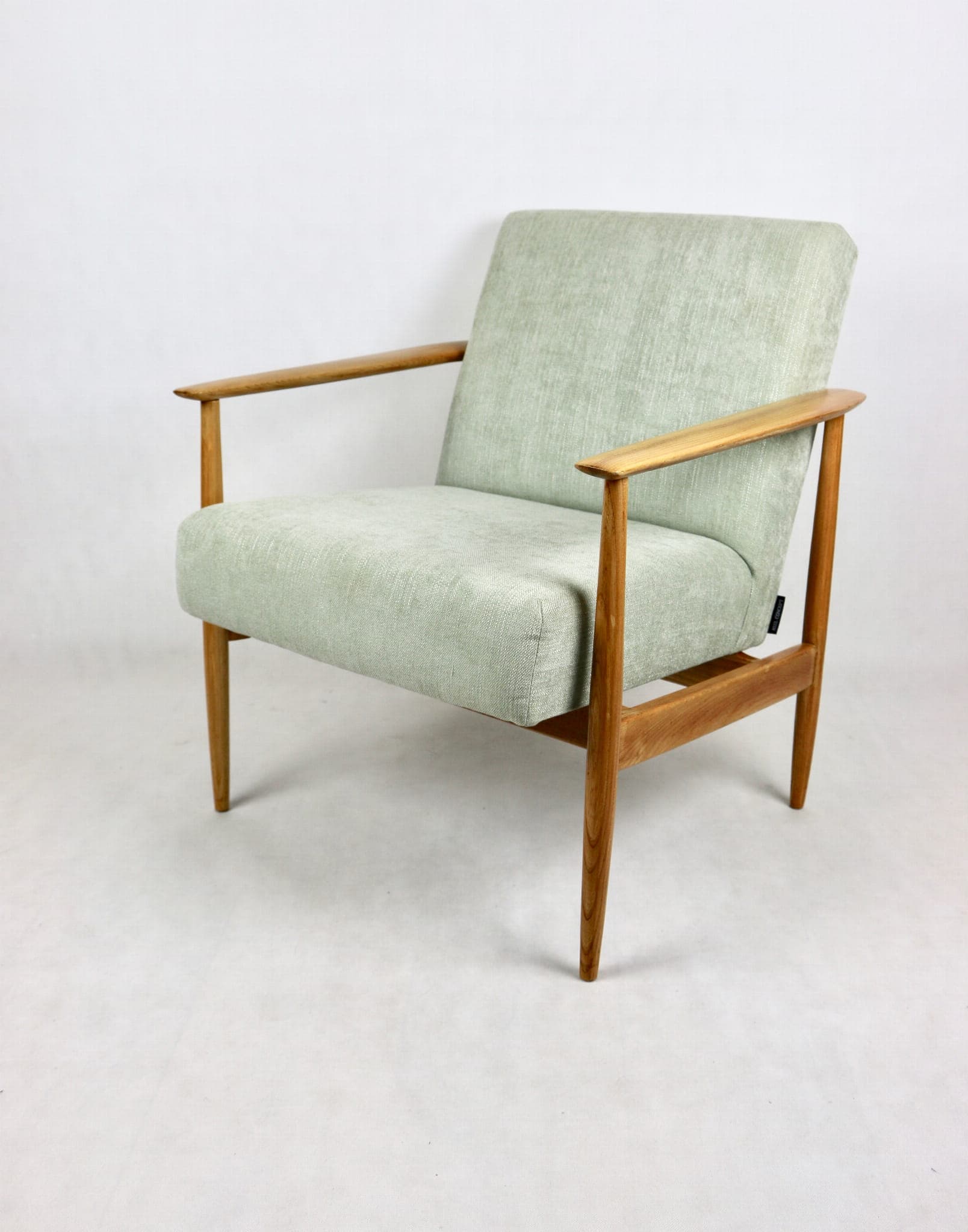 Armchair, green, ash, Denmark, 1970s. - 107616