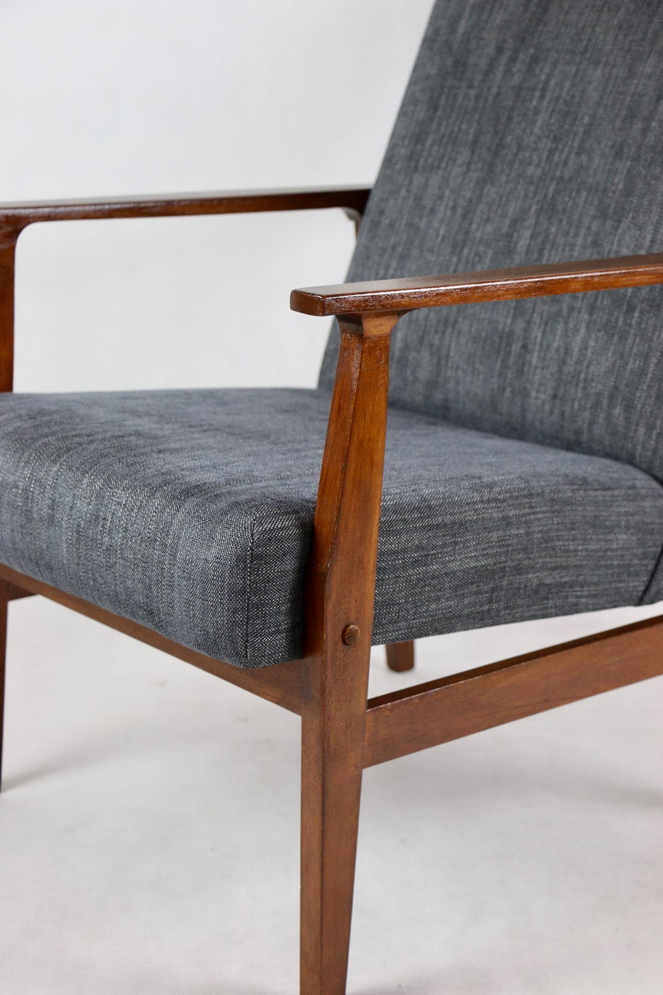 Armchair, grey textured upholstery, wood, 1970s. - 107511