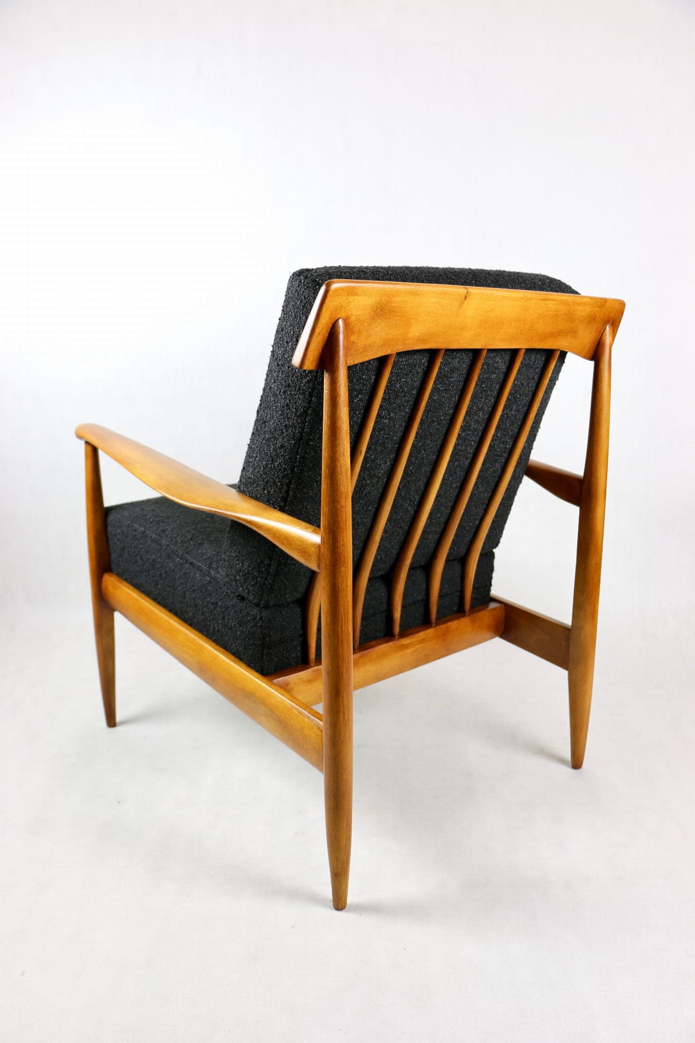 Armchair, black bouclé, wood, Denmark, 1970s. - 107371
