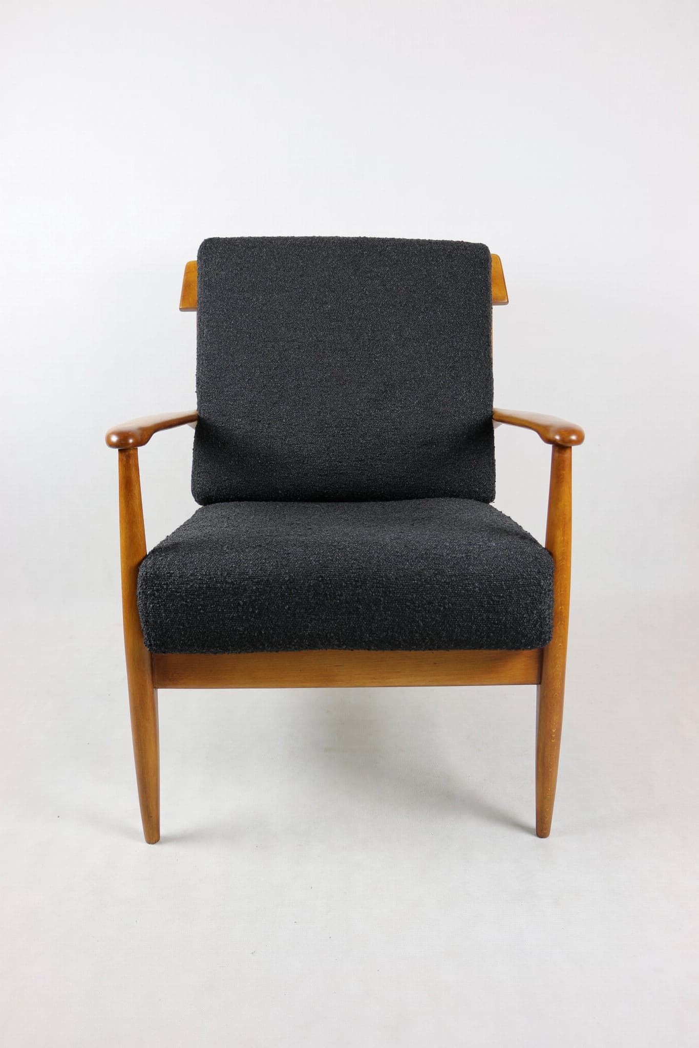 Armchair, black bouclé, wood, Denmark, 1970s. - 107373