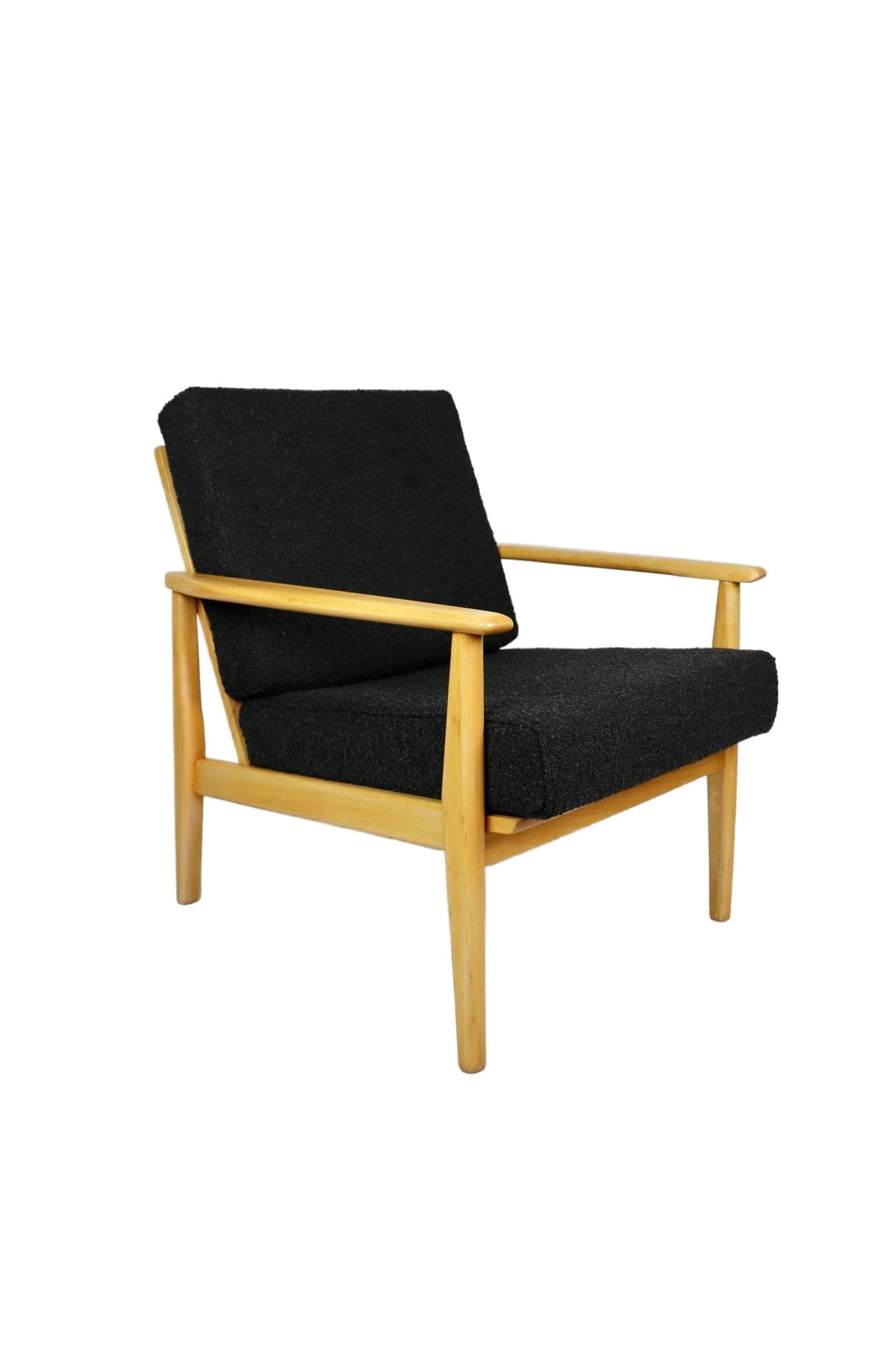 Armchair, black boucle, light wood, Denmark, 1970s.