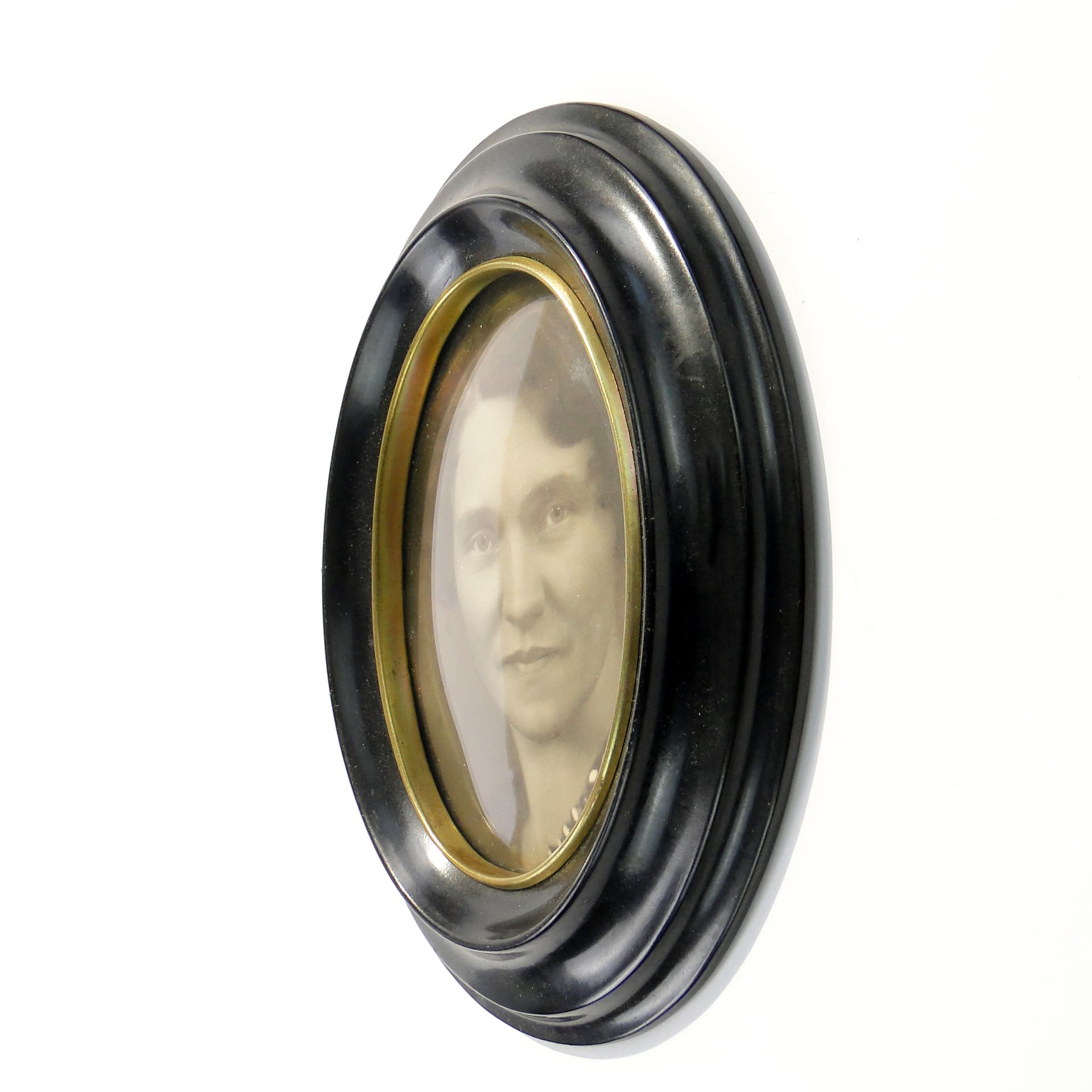 Elliptical photo frame, black bakelite, Sweden, 1950s. - 7884